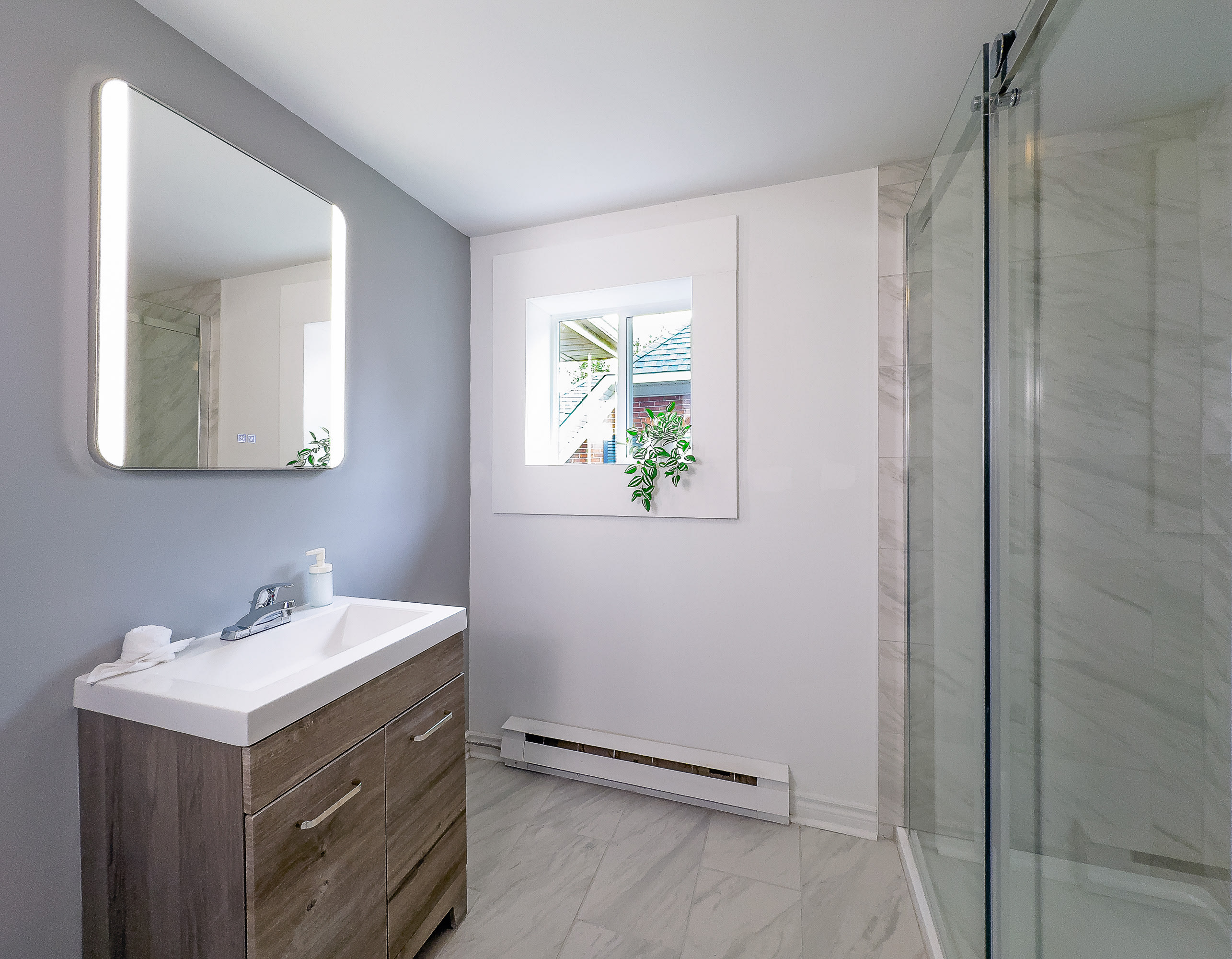 Large standing shower in the modern bathroom