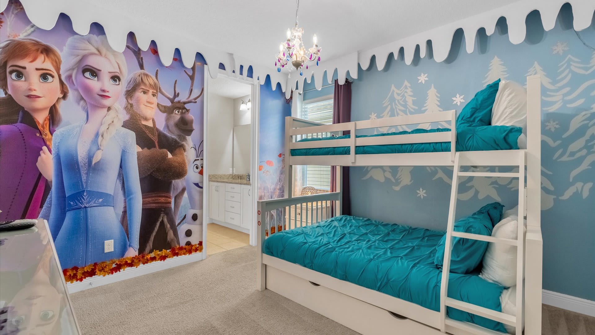 Enchanting Frozen-themed room with cozy bunk beds, perfect for kids to dream in a winter wonderland.