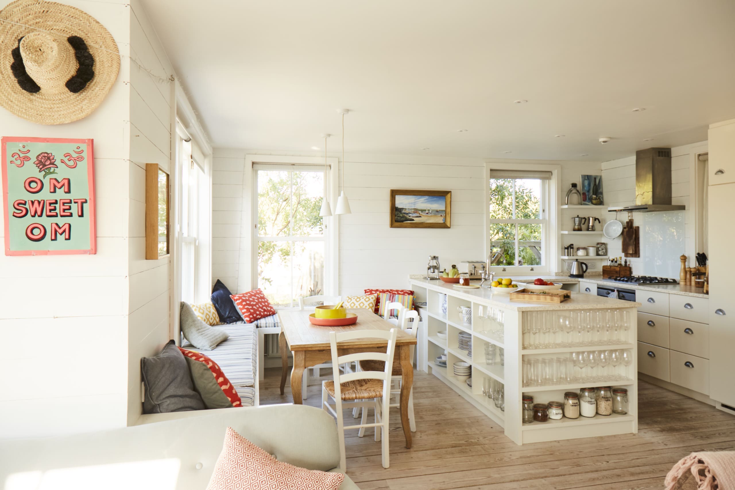 Bright and airy kitchen with a cozy dining area, perfect for family meals and gatherings