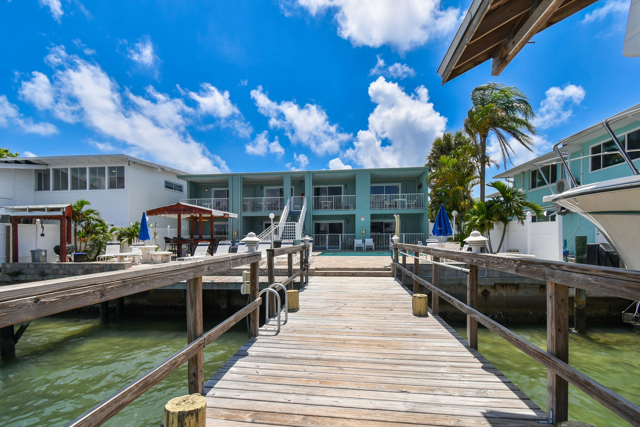 Enchanted Inn Suite #4: Waterfront, Pool, Fishing Dock, Boat Docks & Tiki Bar! — Clearwater Beach Enchanted Inn, FL — vacation rental