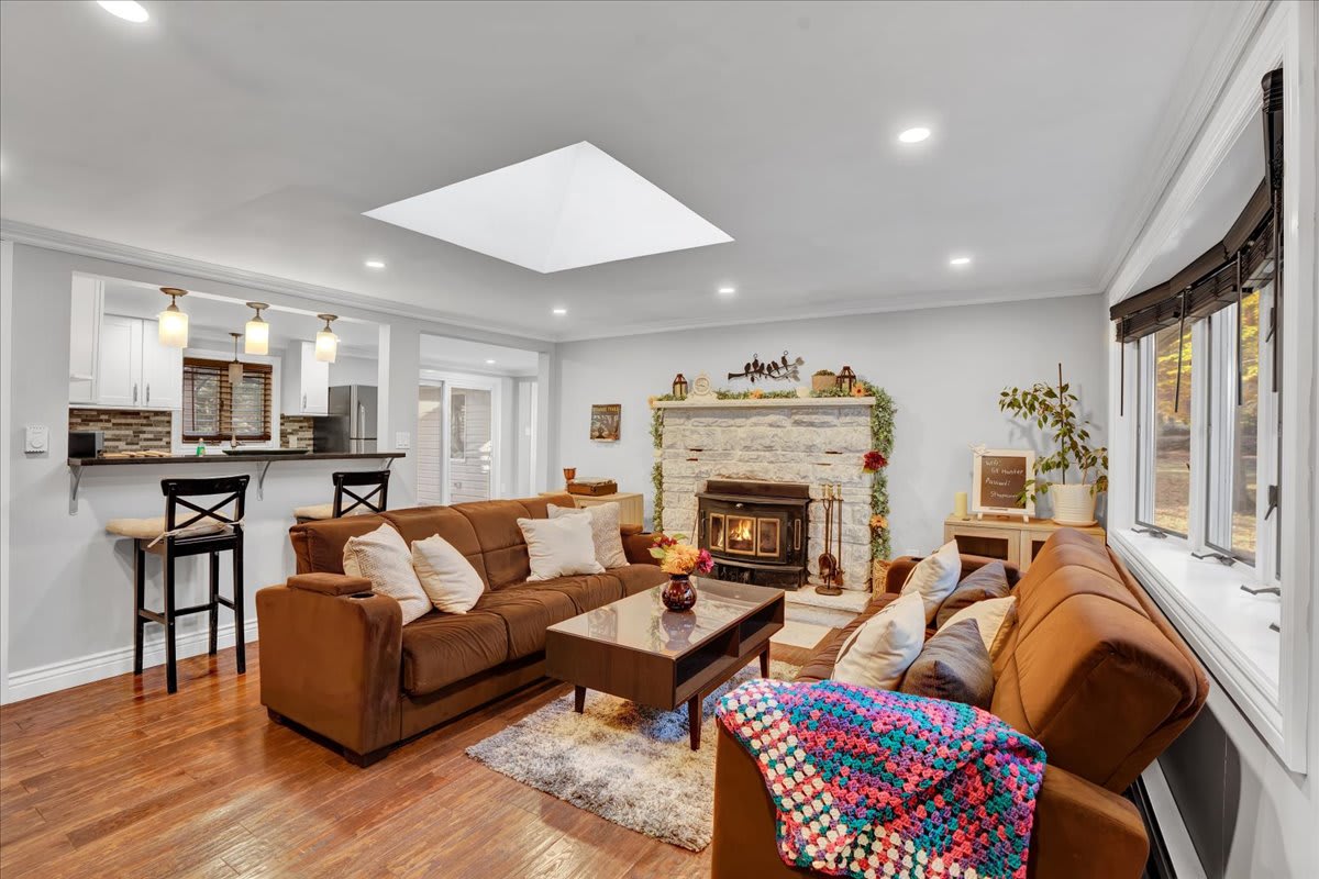 The living area and kitchen flow together, making it an ideal space for social gatherings.