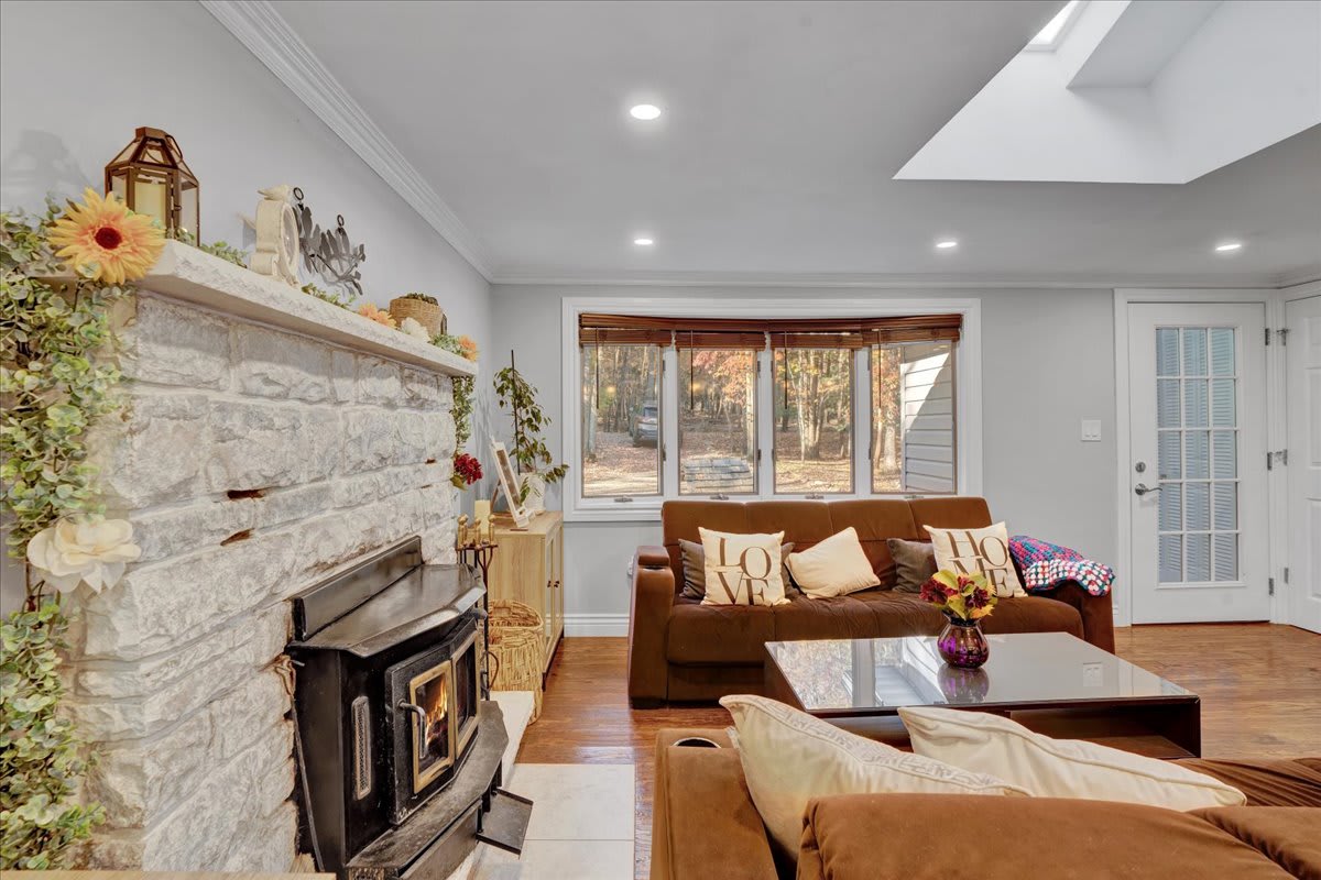 The heart of the home! This cozy lounge area, complete with a stunning stone fireplace, invites you to curl up and relax. Whether it’s a chilly night or a quiet morning, this space feels like home.
