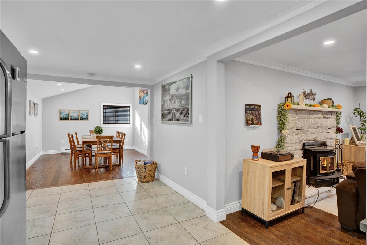 Seamless Open-Concept Flow
Designed for comfort and connection, the dining area blends effortlessly into the living space, offering an inviting atmosphere for family dinners or game nights by the fire.