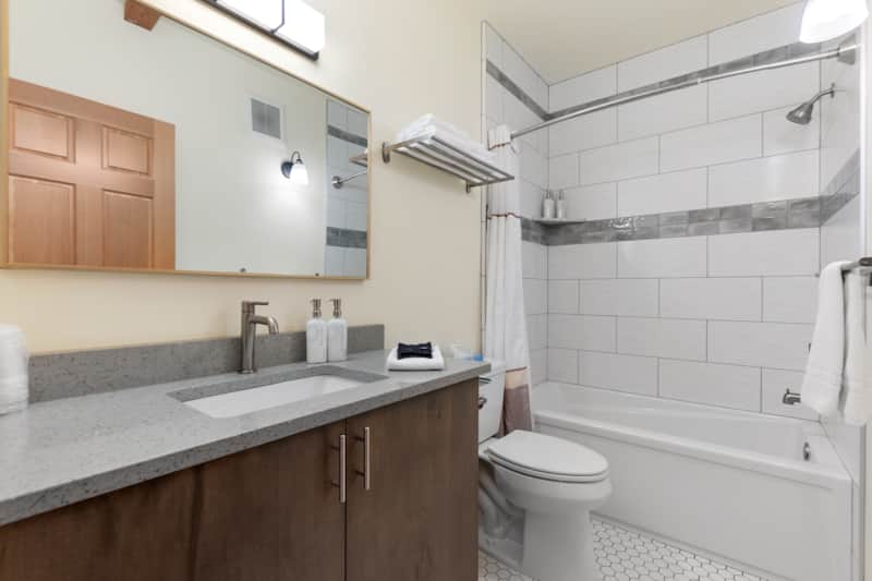 Full bathroom with deep soaking tub