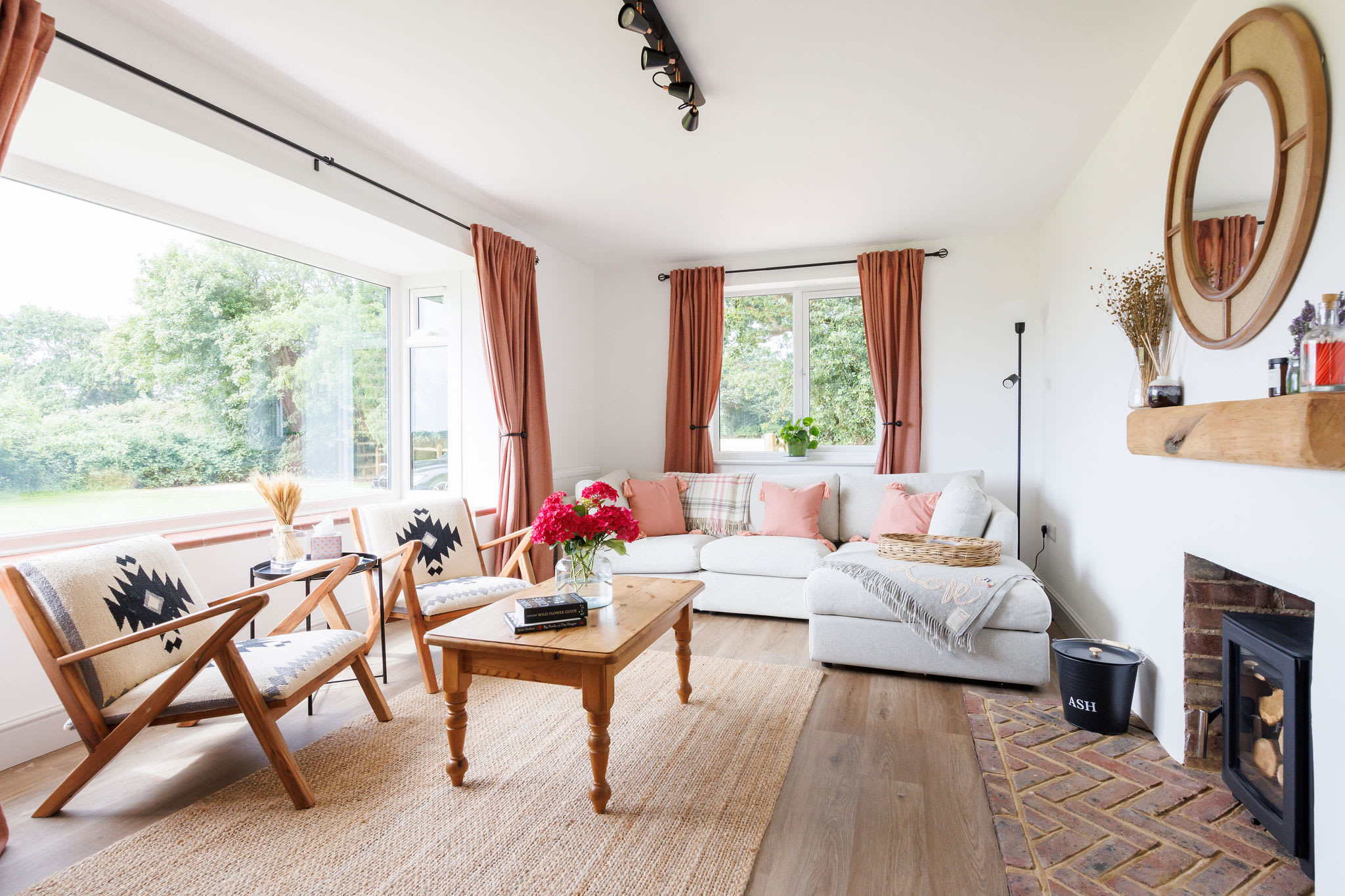 Relax in our bright and cozy living room with stunning countryside views