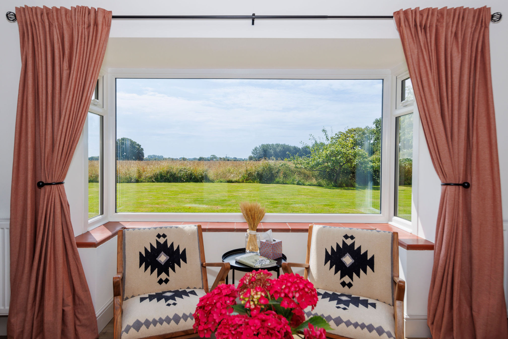 Soak in the beautiful countryside views from the comfort of our cozy chairs
