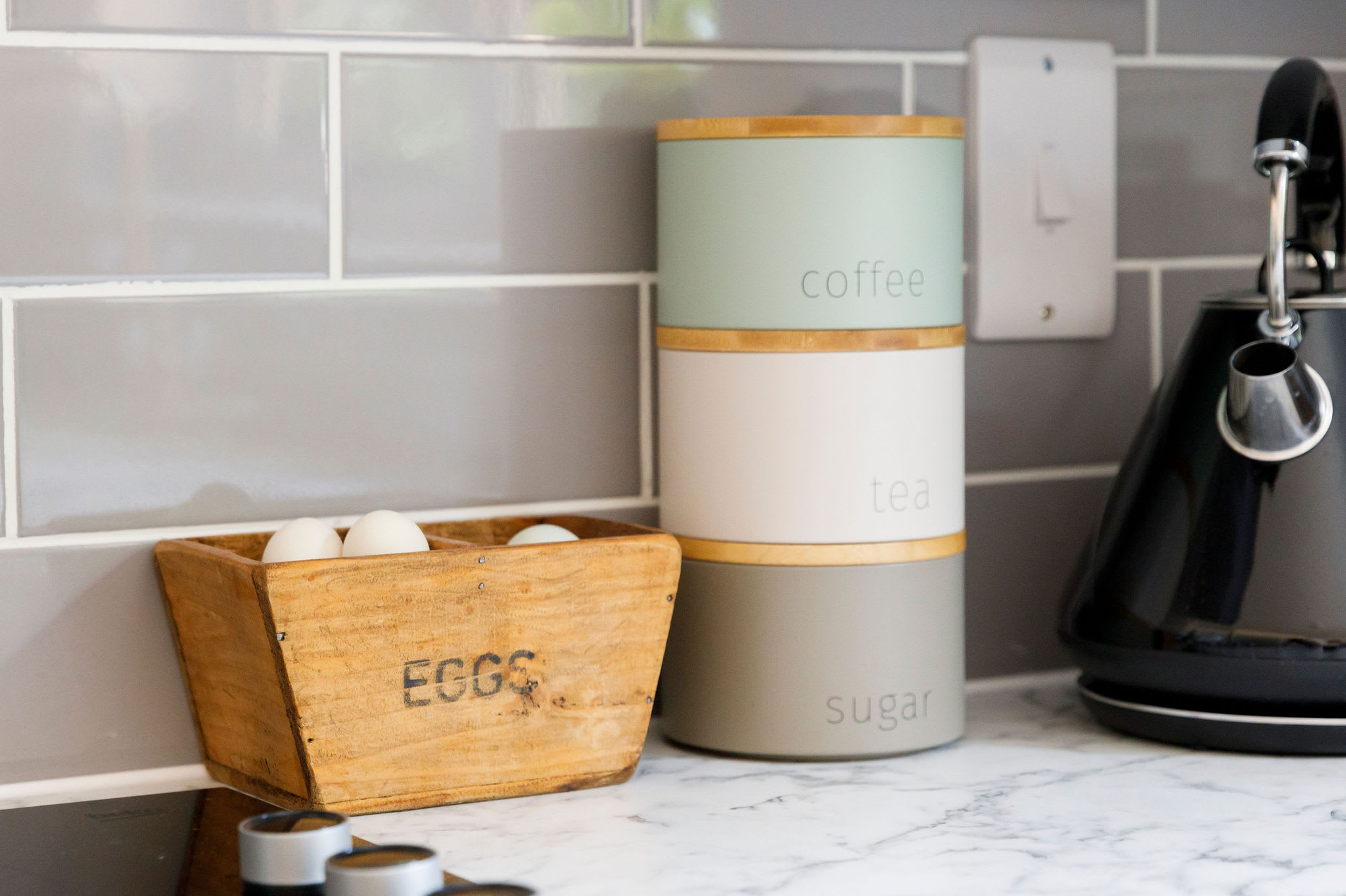 Everything you need for your morning brew, from coffee to tea, all set up in our modern kitchen