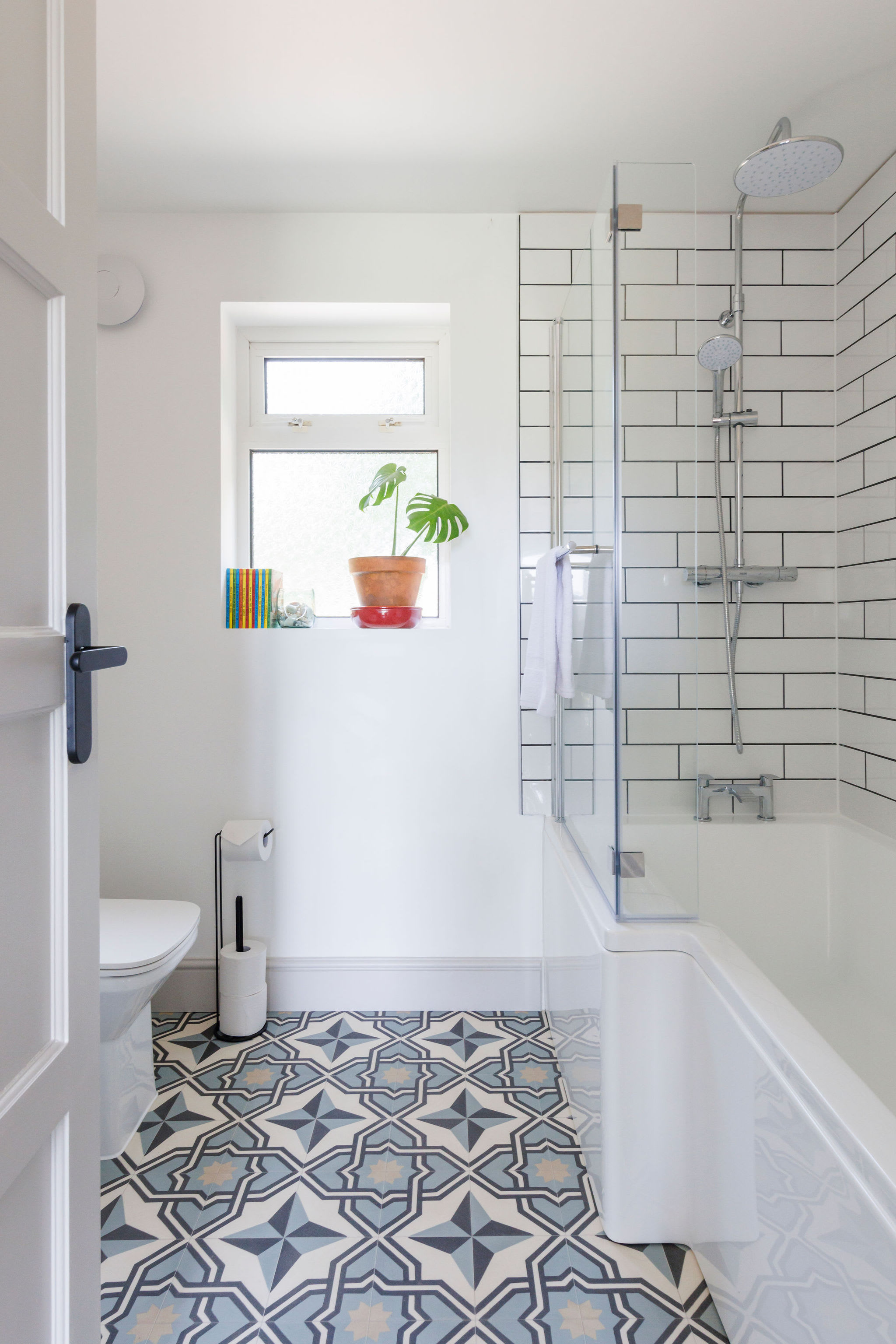 Freshen up in our stylish bathroom featuring modern fixtures and a serene atmosphere