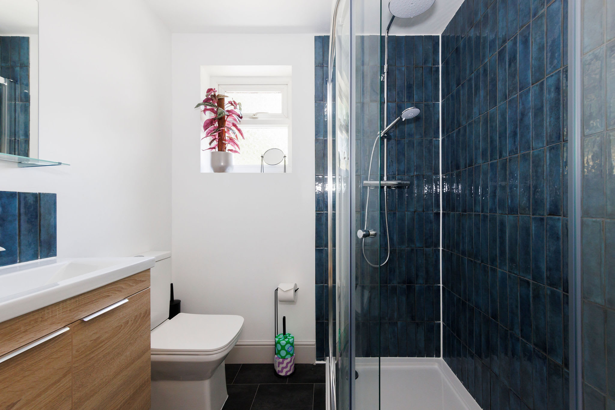 Elegant en suite with a walk-in shower and modern fixture