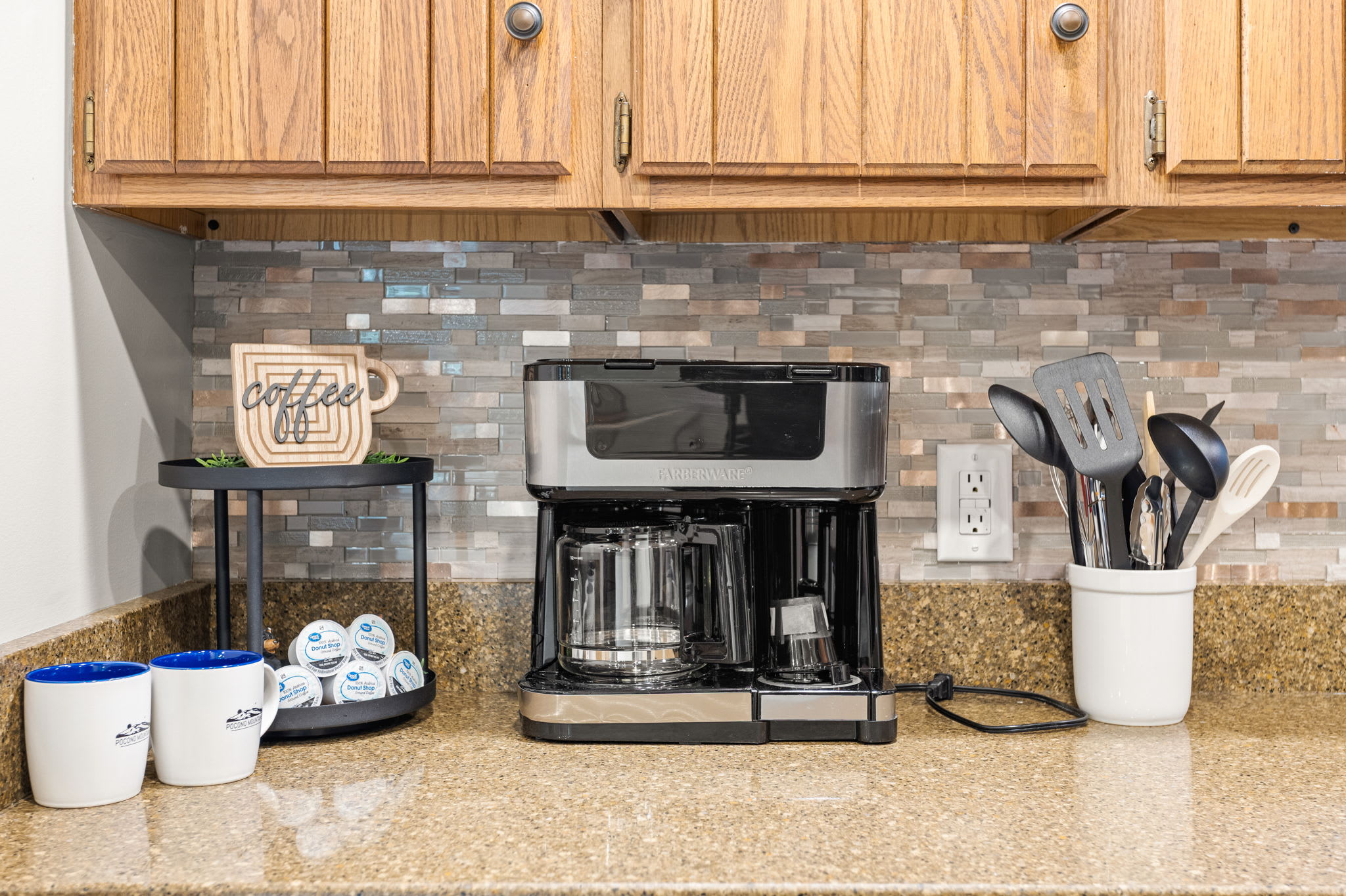 Charming Coffee Station – A cozy coffee nook with a modern drip coffee maker, stylish mugs, and a rustic "Coffee Time" sign to start your mornings right.