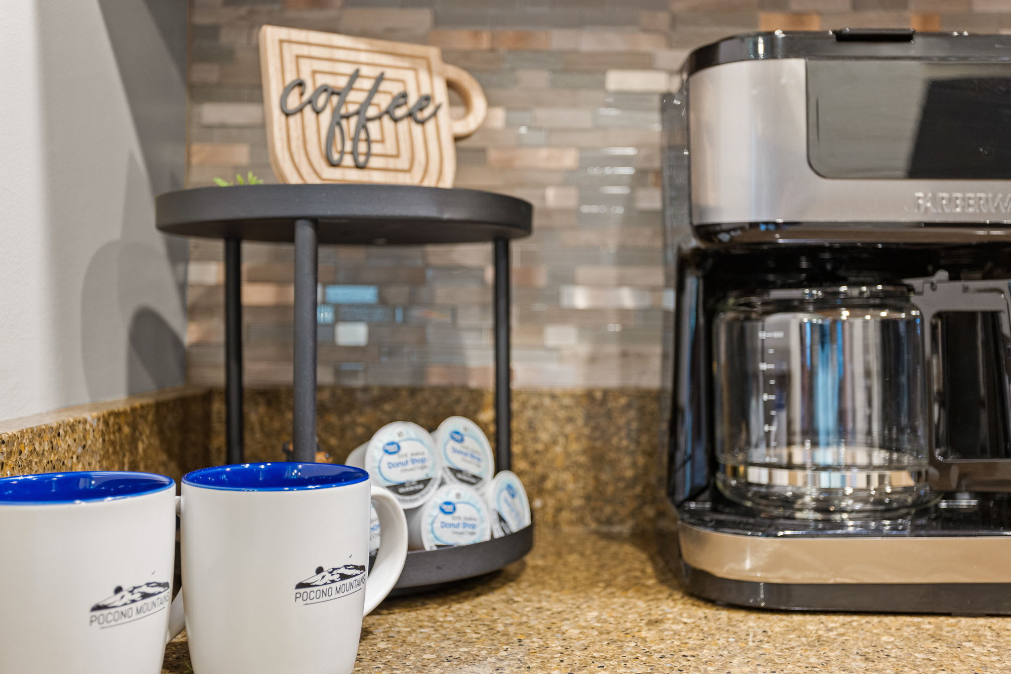 Morning Coffee Made Easy – A sleek and functional coffee station with all the essentials, set against a stylish backsplash for a perfect start to the day.