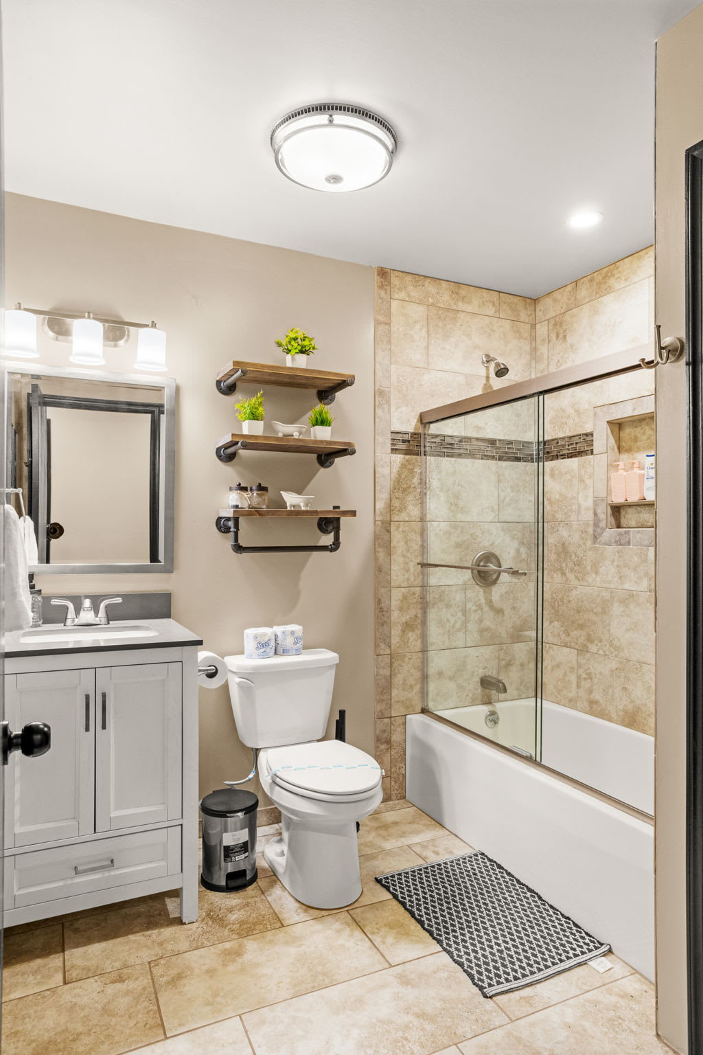 Elegant & Functional Bath Space – A well-appointed bathroom with modern fixtures, a spacious vanity, and a luxurious walk-in shower for ultimate comfort.
