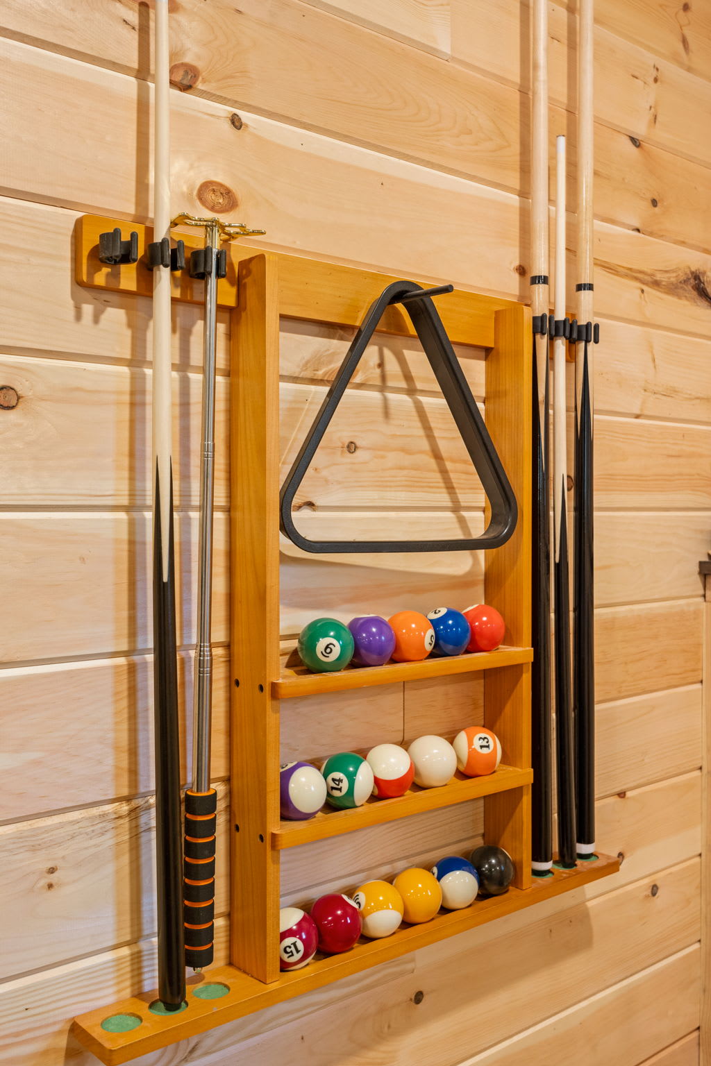 Classic Pool Cue & Ball Rack – A sleek and functional wall-mounted pool cue and ball rack, keeping everything organized while adding to the room’s charm.