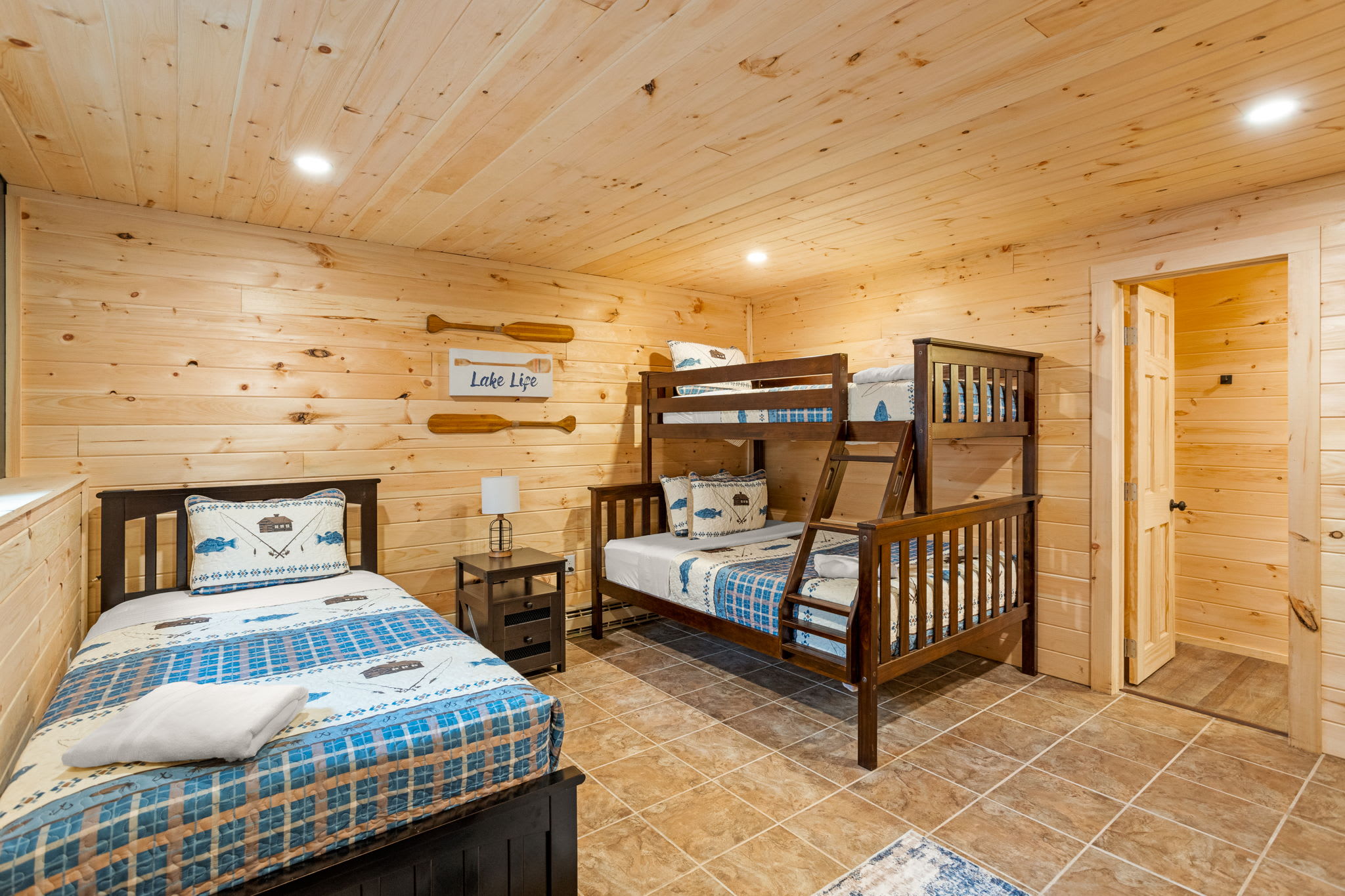 A spacious sleeping area with multiple beds, offering the perfect setup for families or groups traveling together.