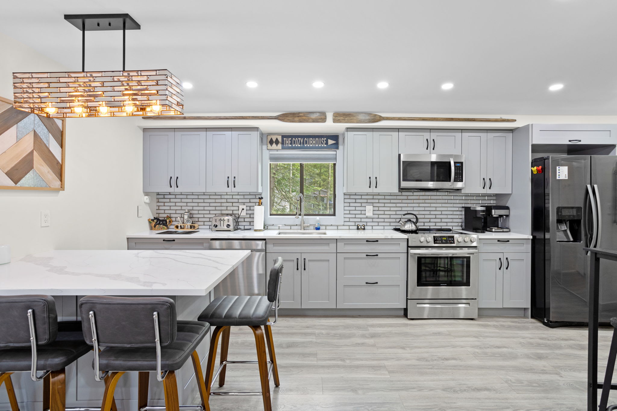 A chef’s dream! The spacious layout, modern fixtures, and high-end appliances make cooking a breeze. Plus, the large island with seating is great for gathering with friends and family.