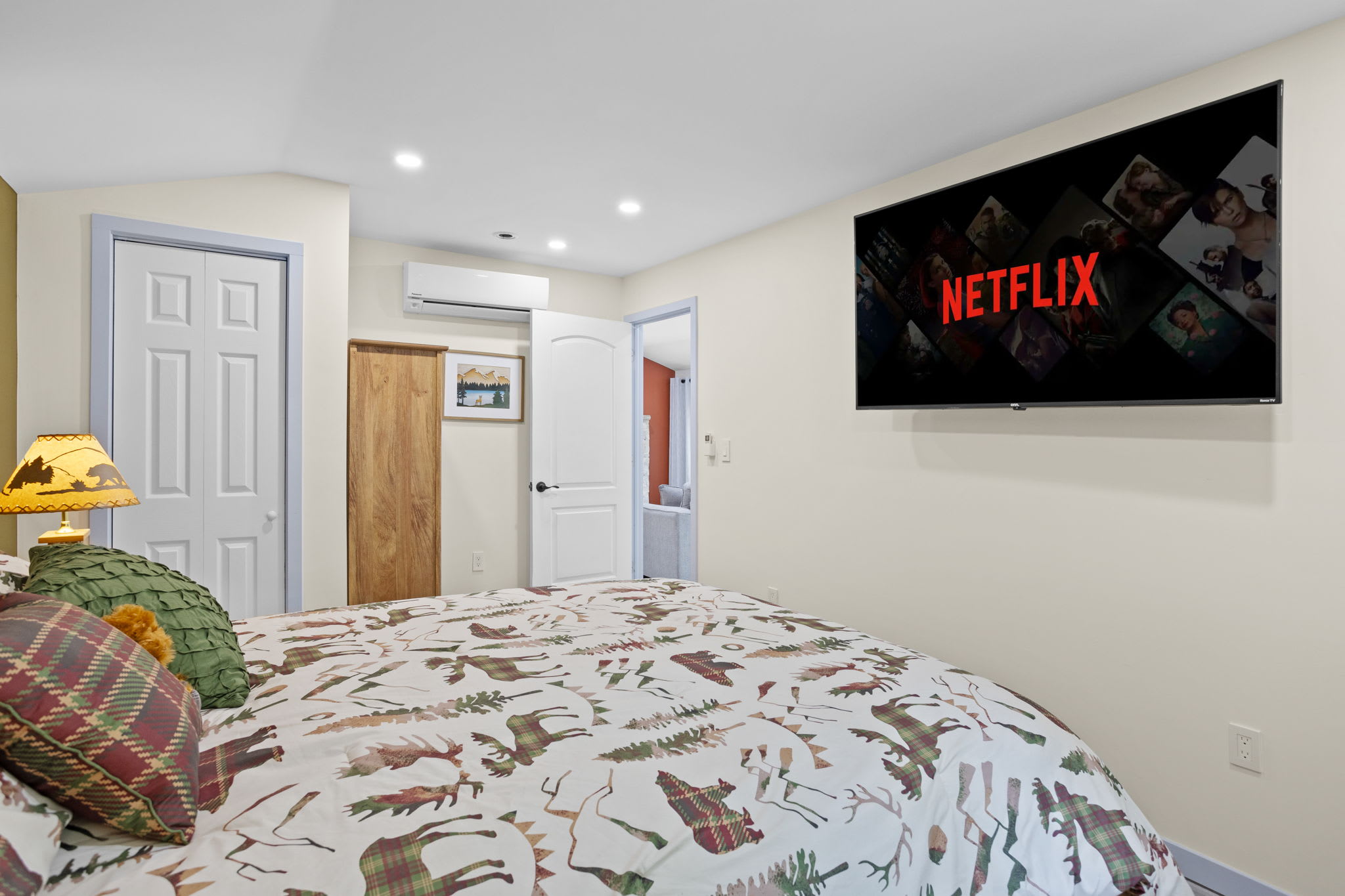 Kick back and watch Netflix from the comfort of your cozy bed. This room blends rustic charm with modern conveniences for a relaxing stay.
