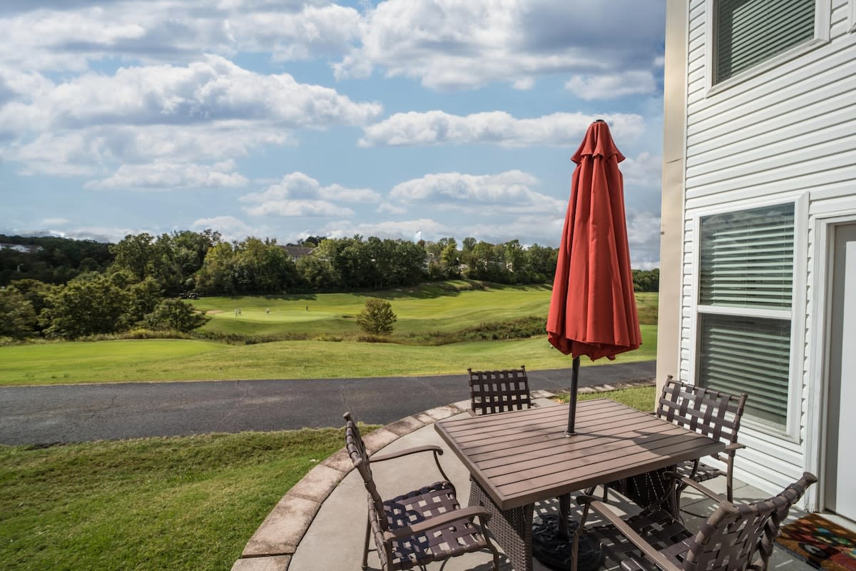 Patio seating overlooking the golf course.