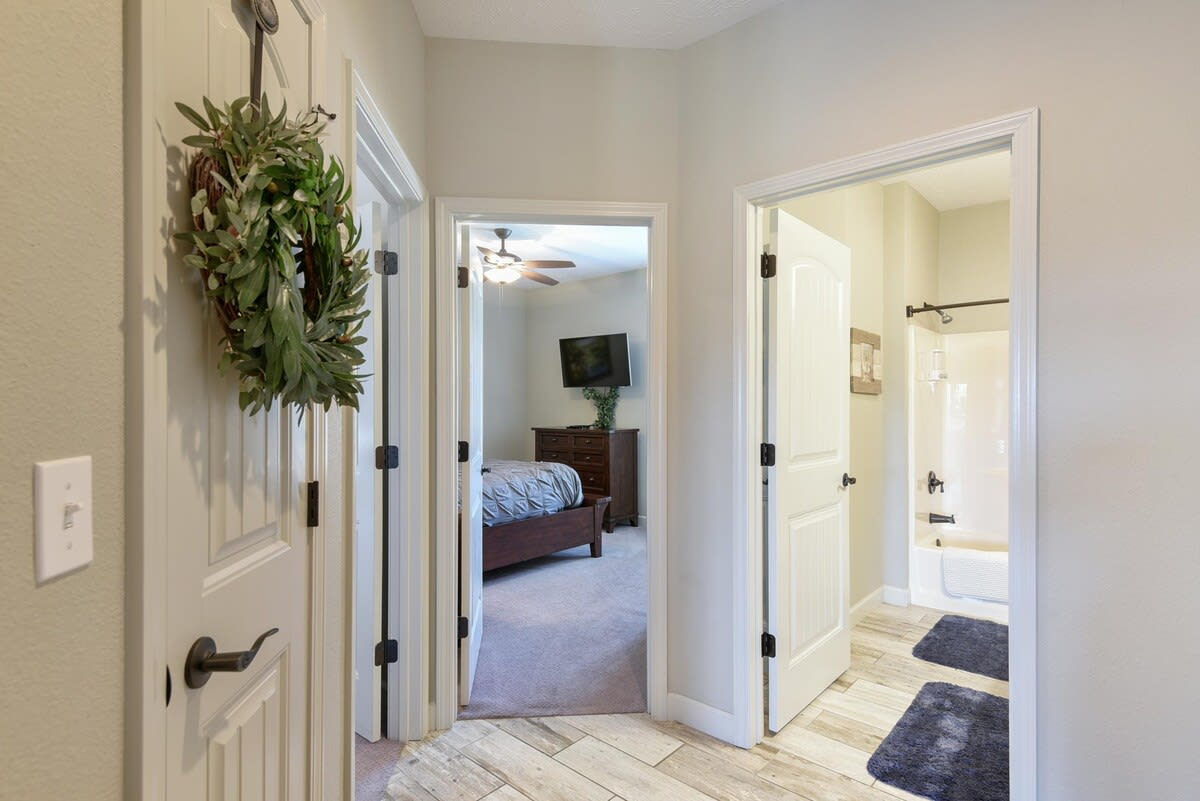 Main hall bathroom also connects directly to guest King Bedroom