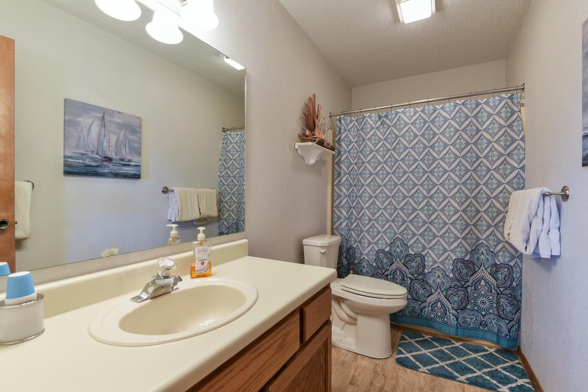 Primary bathroom with shower/tub combo