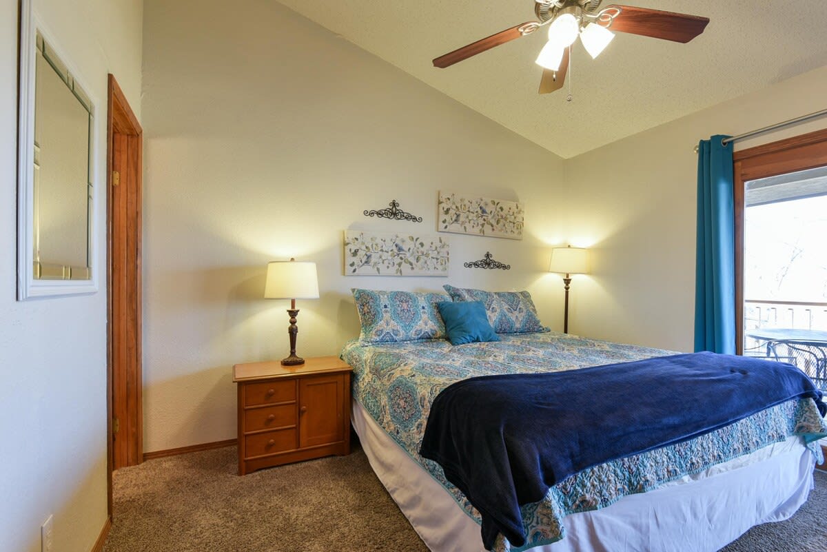 Primary King bedroom with walkout access to back deck!