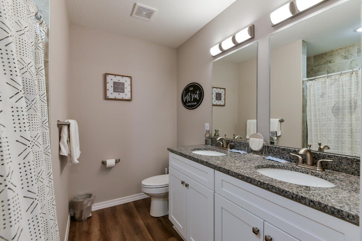 Primary bedroom attached bathroom - walk in shower with shower bench (small step into shower)