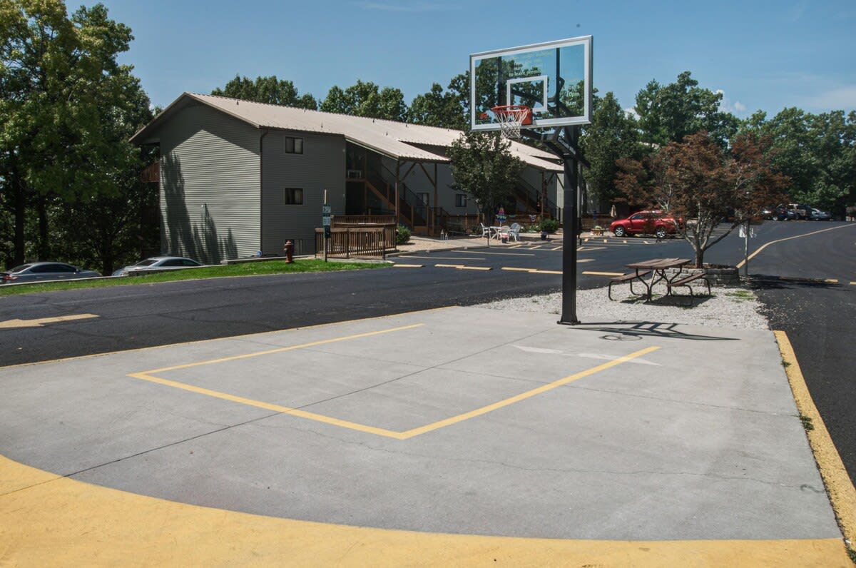 Basketball hoop located at the end of the neighborhood