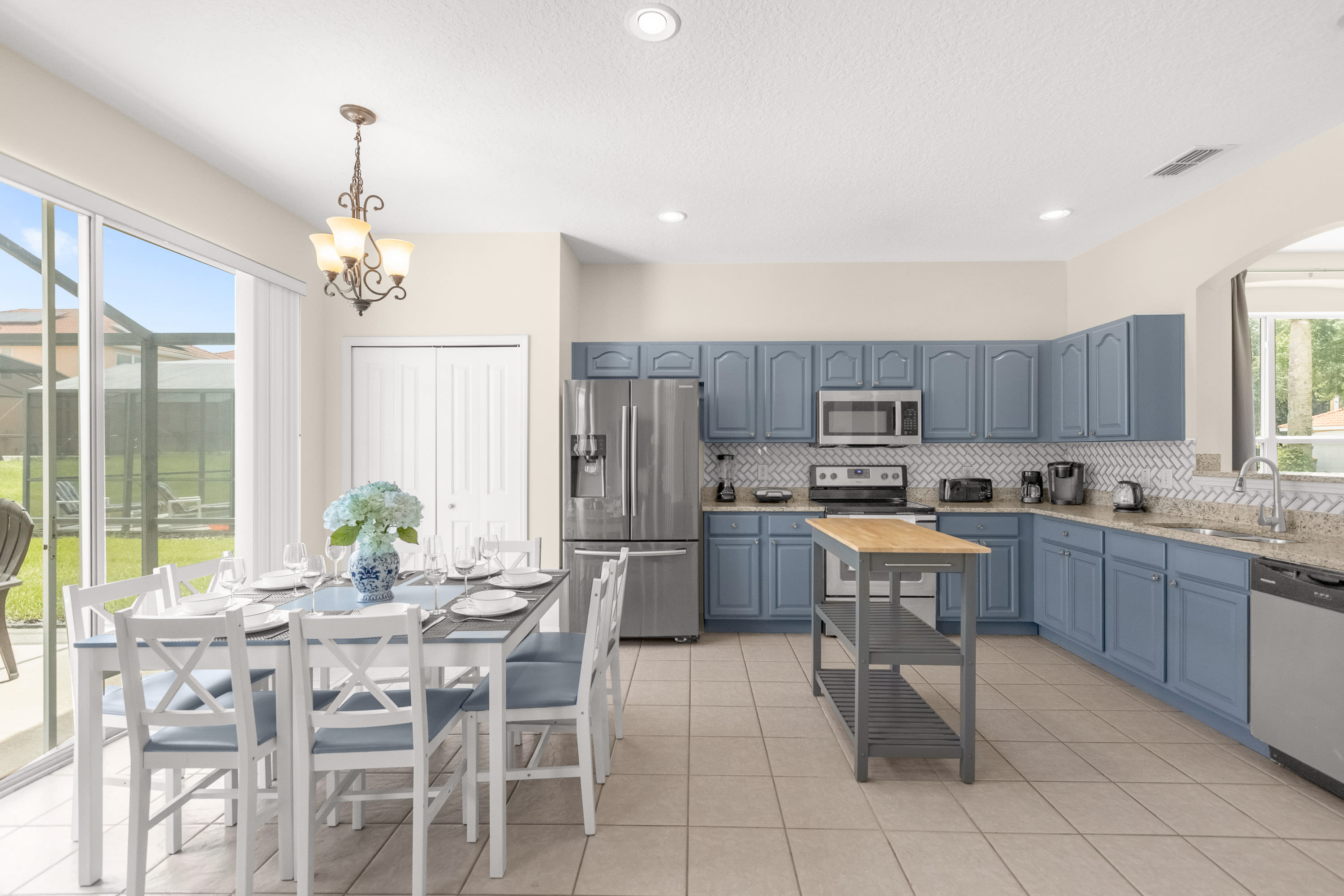 Sunny Dining Space With Large Windows And Stunning Outdoor Views