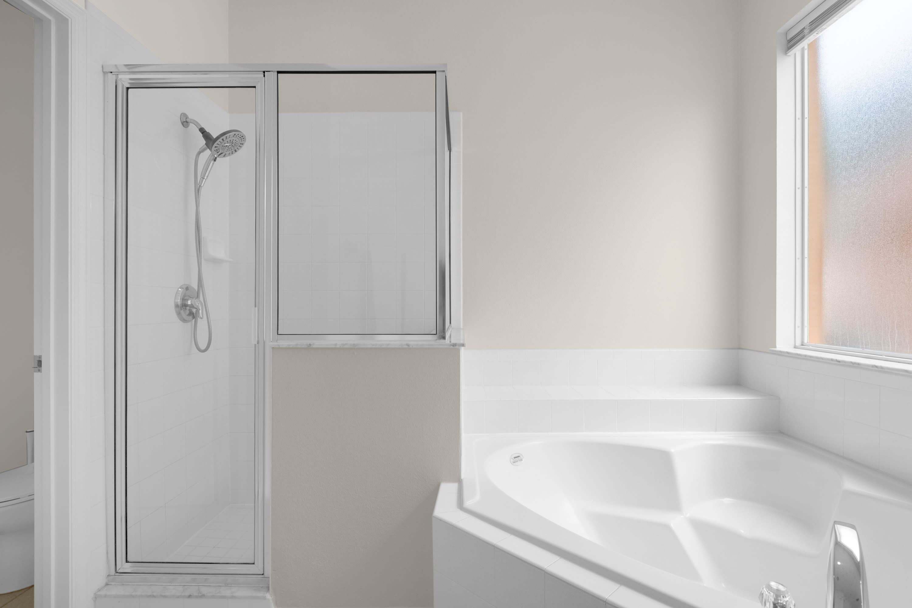 Modern Bathroom With Walk-In Shower And Natural Light