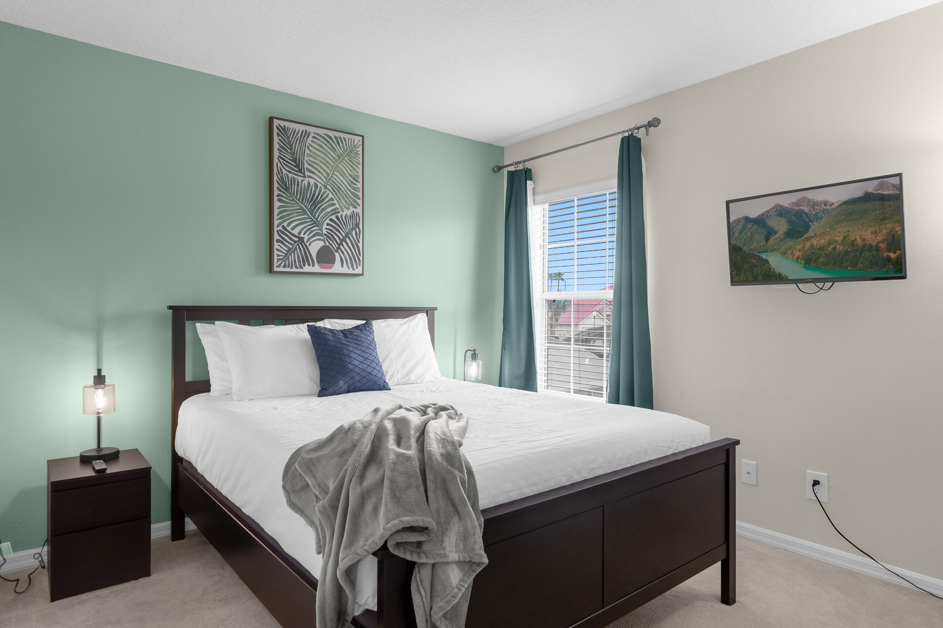 Stylish King Bedroom With Soothing Green Accents And Elegant Décor