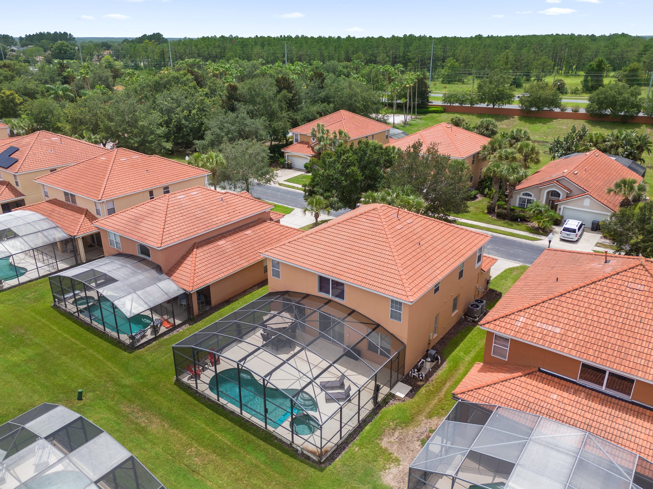 Side Aerial Perspective Highlighting Private Pools And Spacious Backyards
