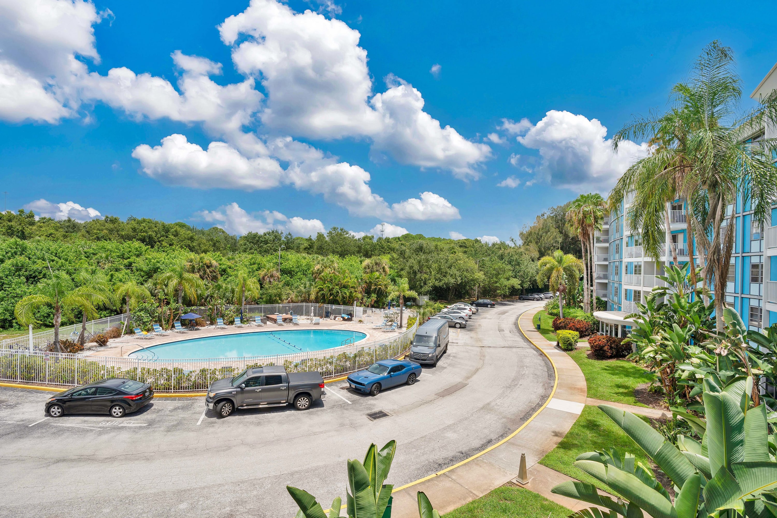 Charming Apartment with Balcony & Pool Views - Photo 1