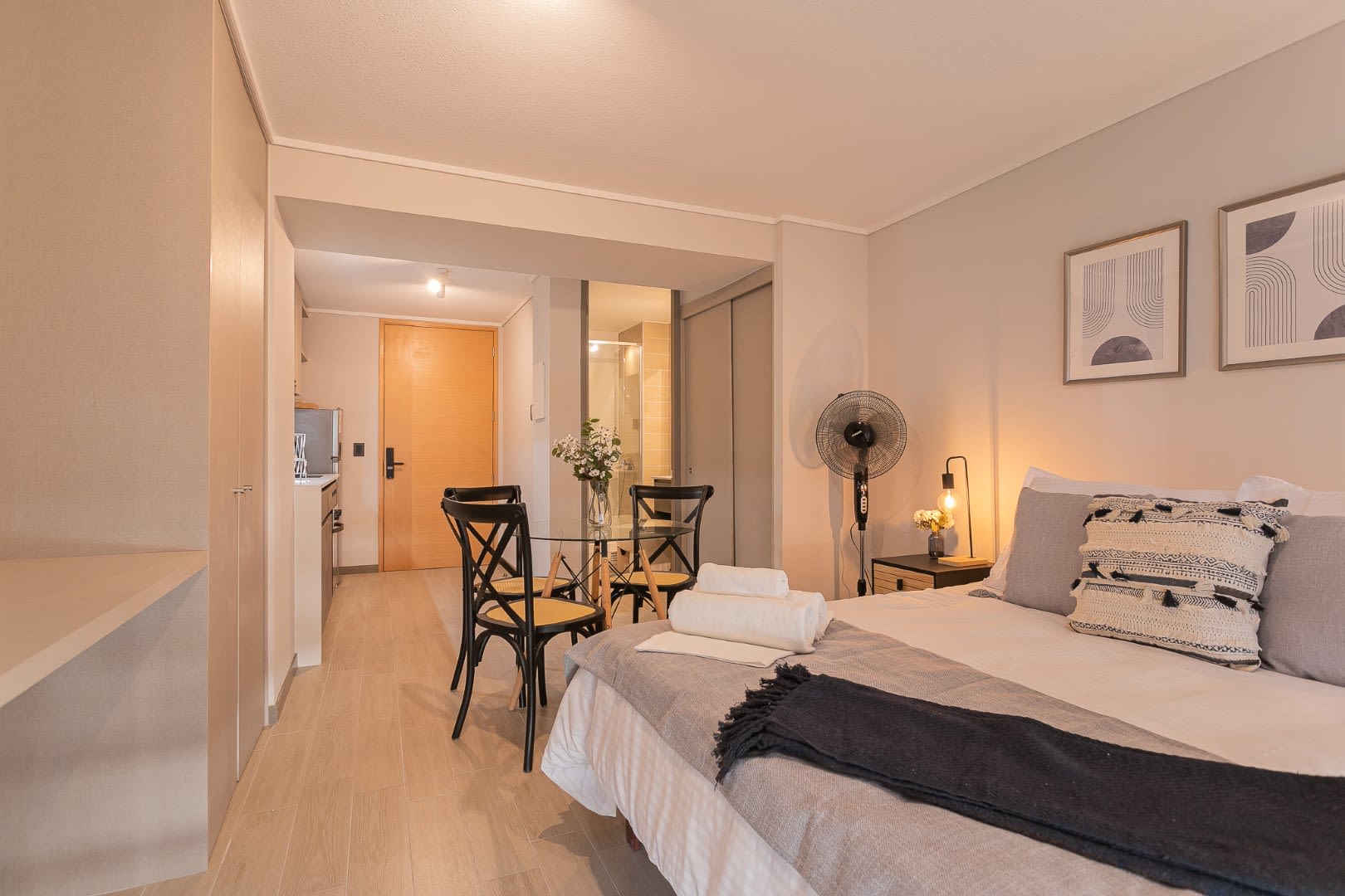 Cozy studio with stylish dining area and inviting decor, perfect for a relaxing stay in Chile.