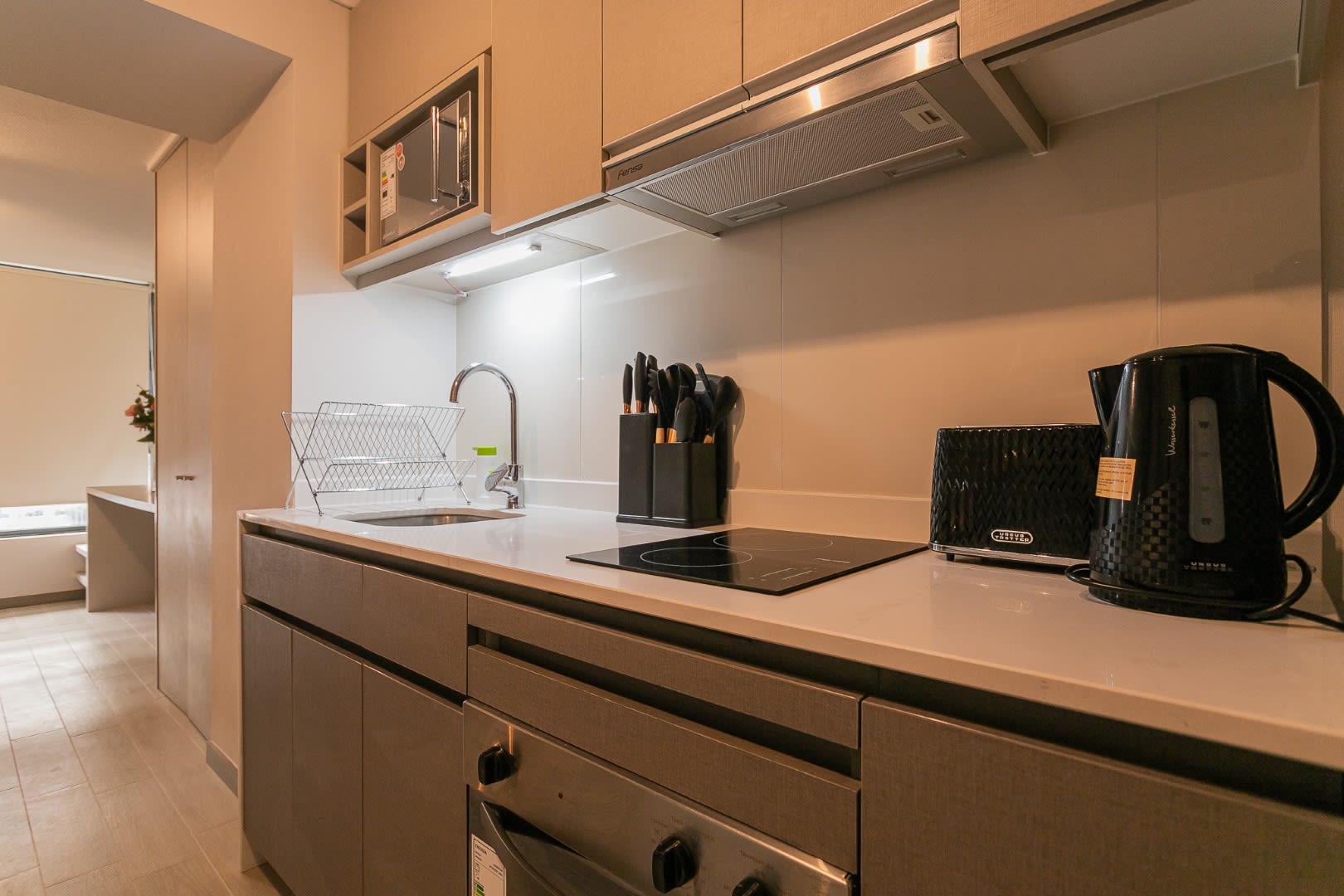 Sleek and modern kitchen with all essentials for a comfortable stay in the city.