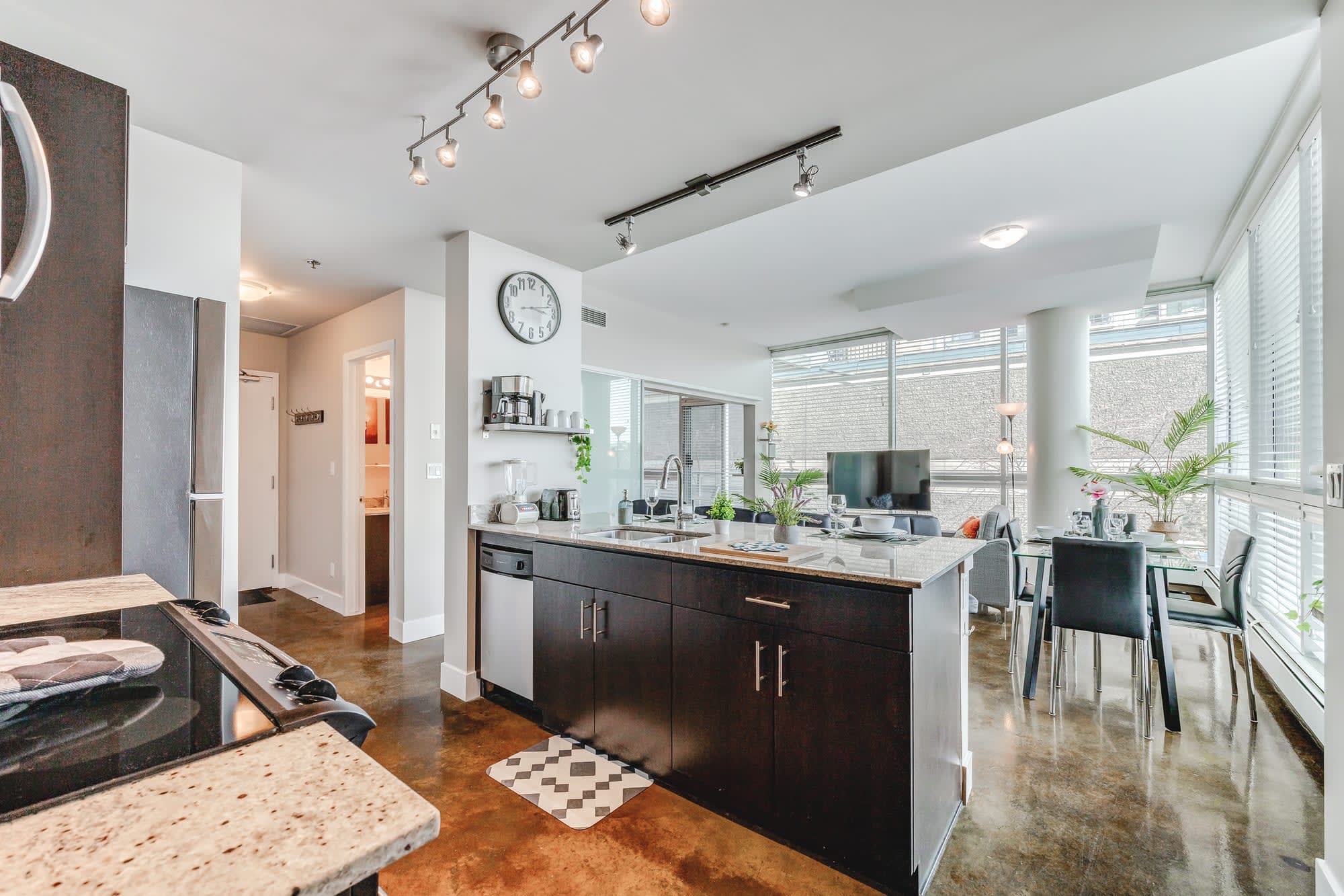 Kitchen includes a dishwasher, and new stainless steel appliances