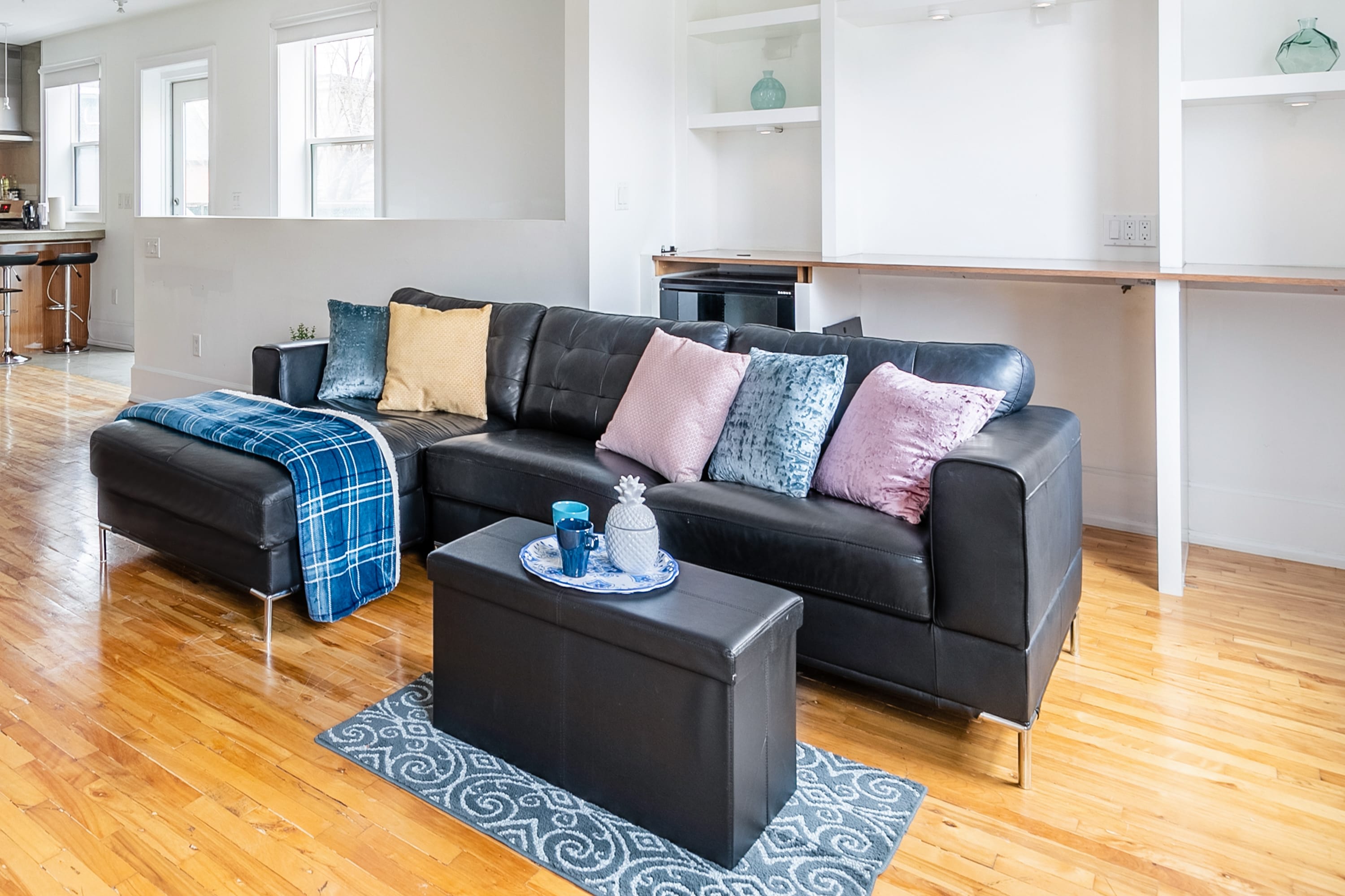 Stylish Seating Area Featuring Elegant Touches And Warm Hardwood Floors