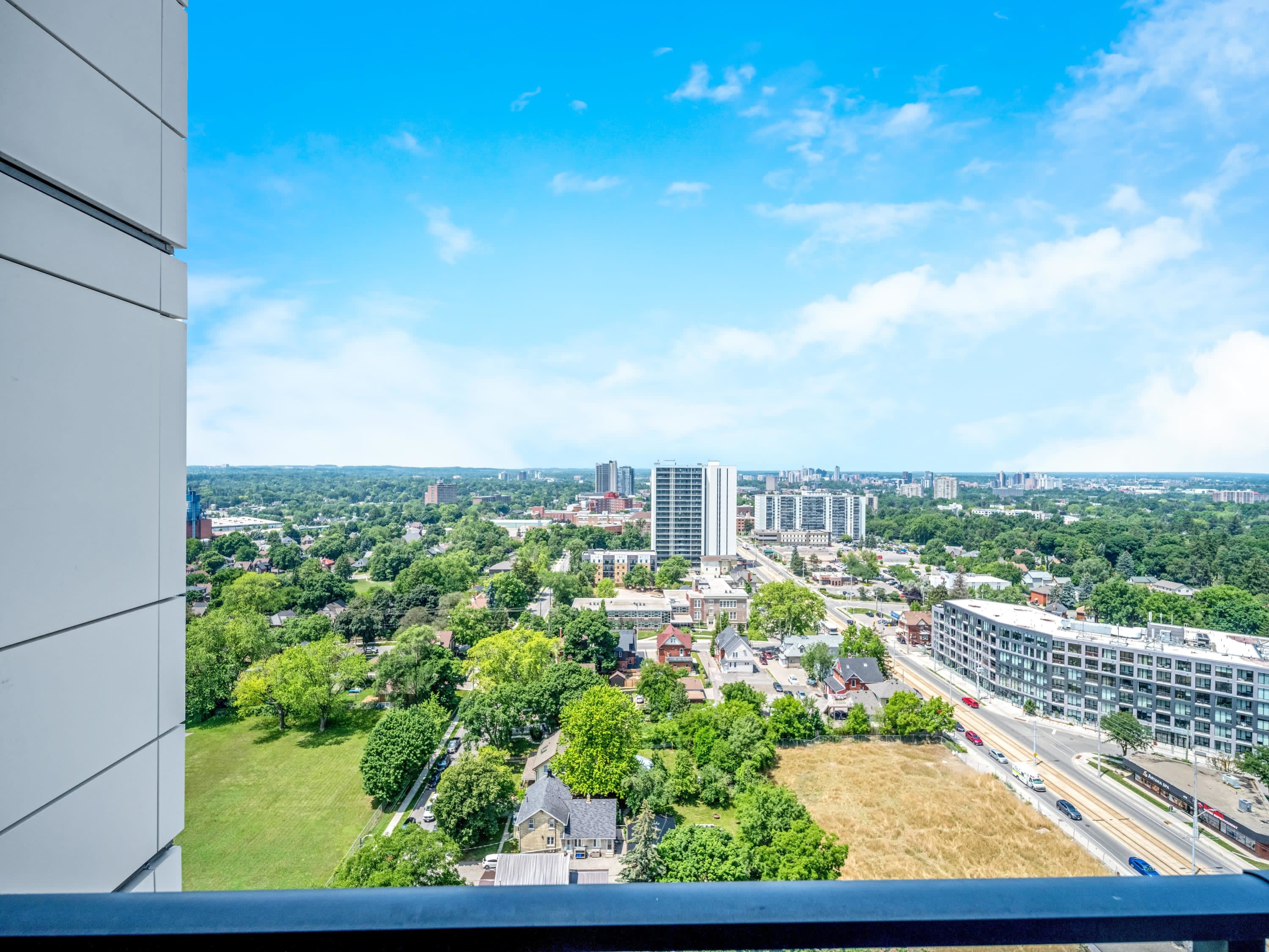 Stunning Aerial Views Of The City And Green Spaces From The Balcony