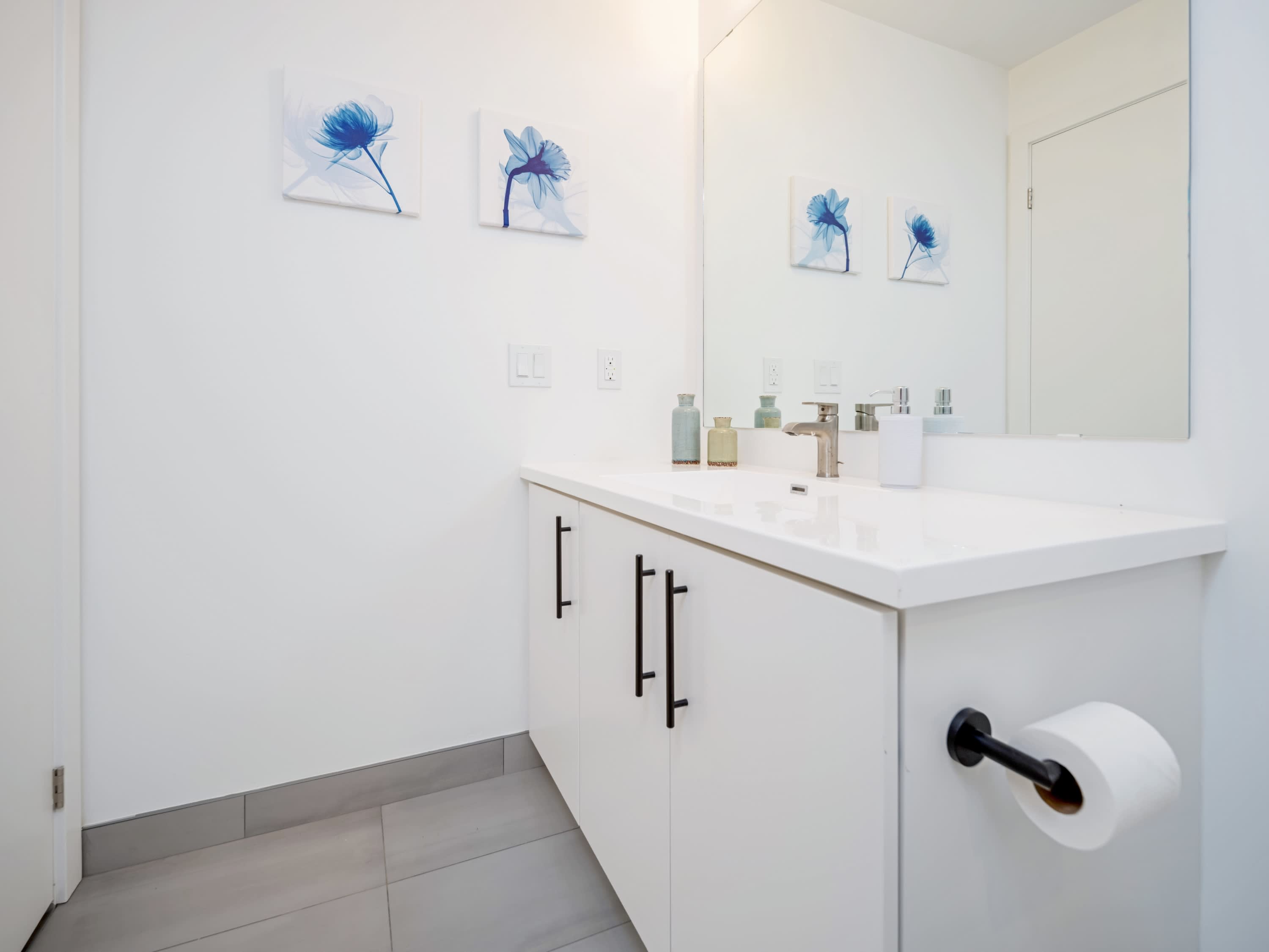 Modern Bathroom With Large Vanity And Polished Finishes