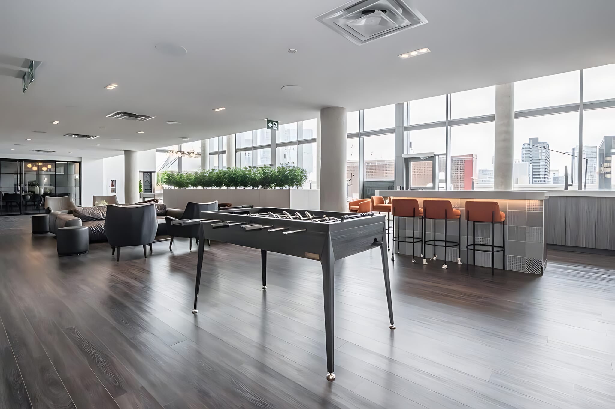 Community Lounge Area with Workspace and Games