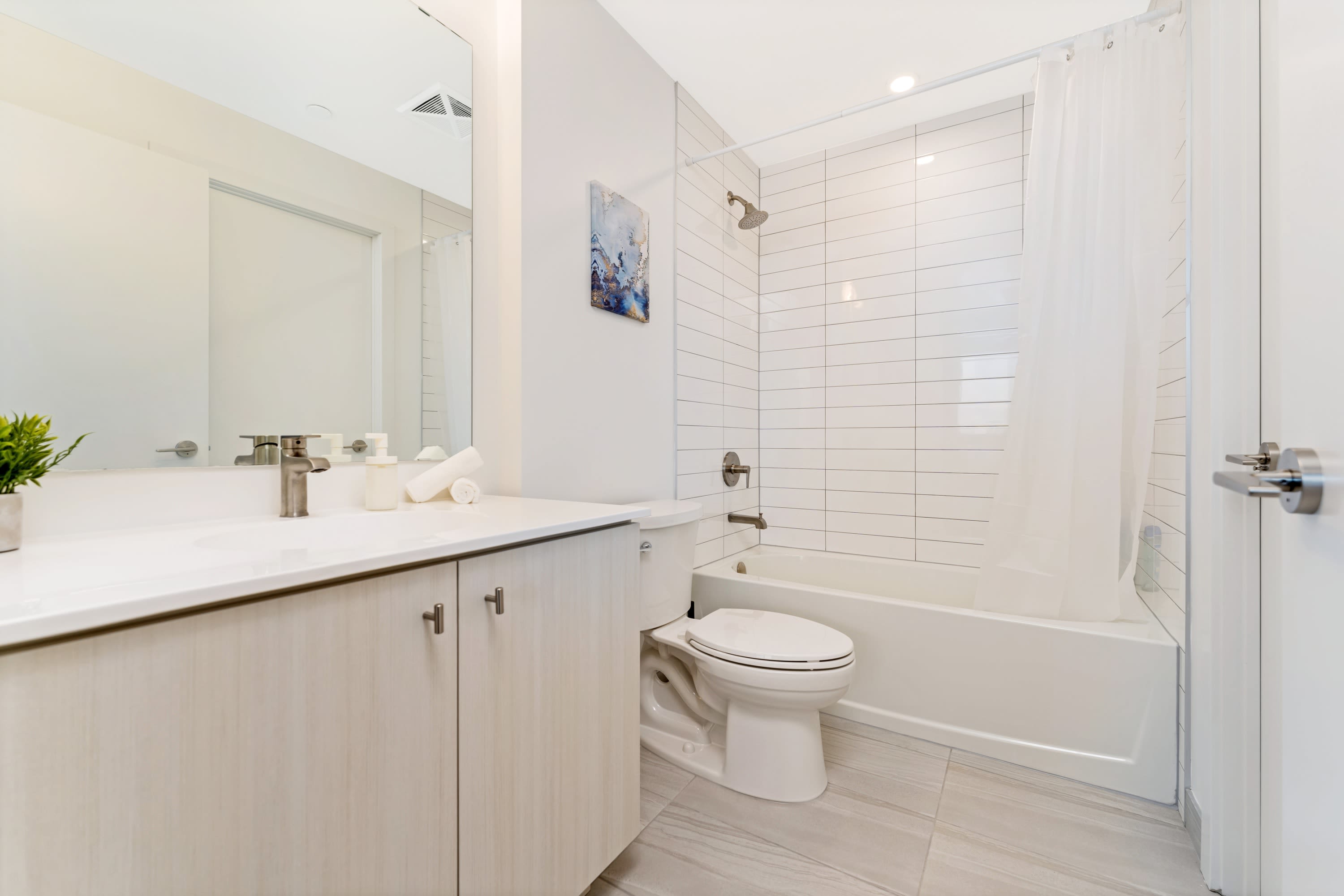 Modern Bathroom Featuring A Large Standing Shower Sleek Vanity And High-Quality Finishes For Your Comfort