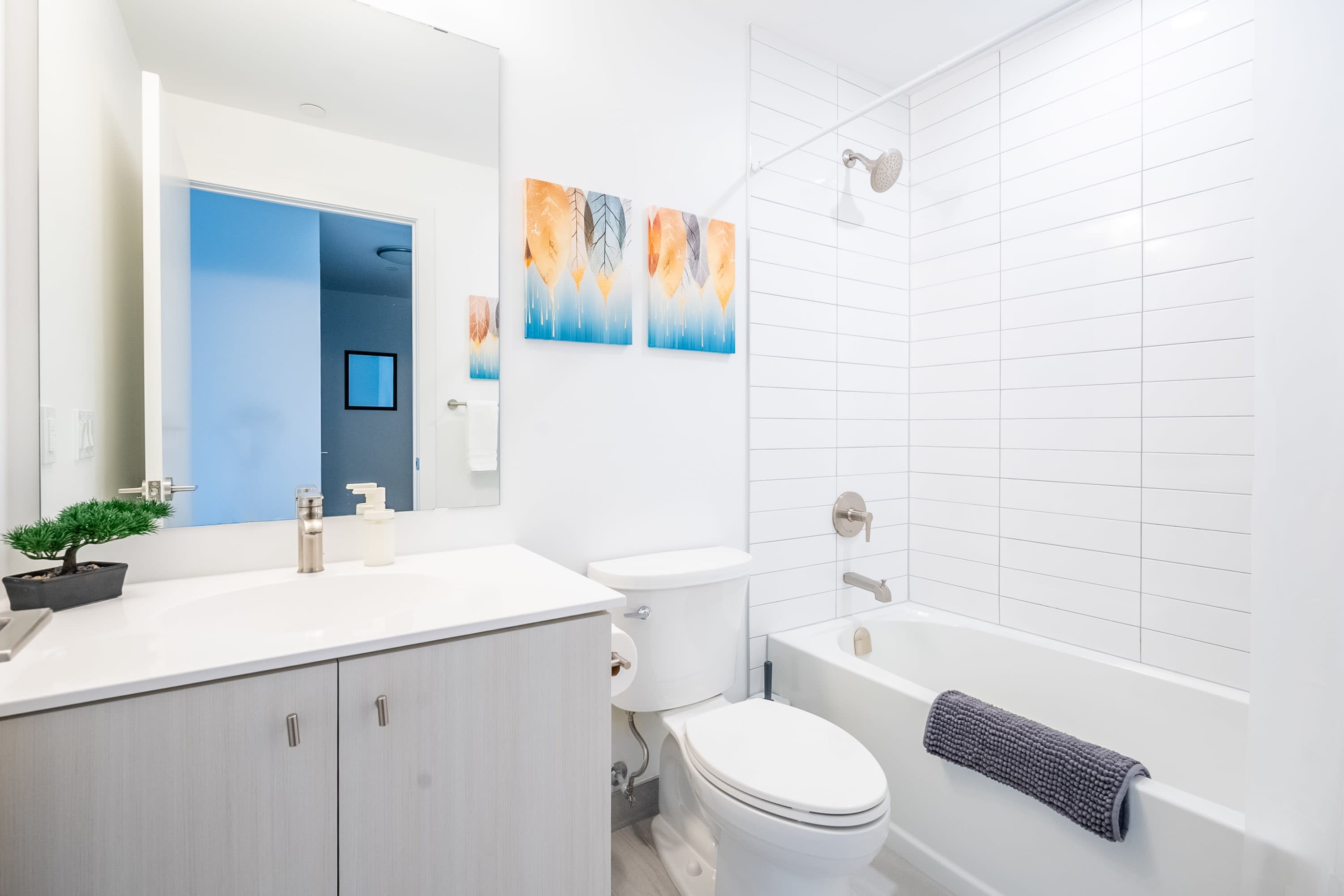 Modern Bathroom With Spacious Standing Shower And Contemporary Fixtures