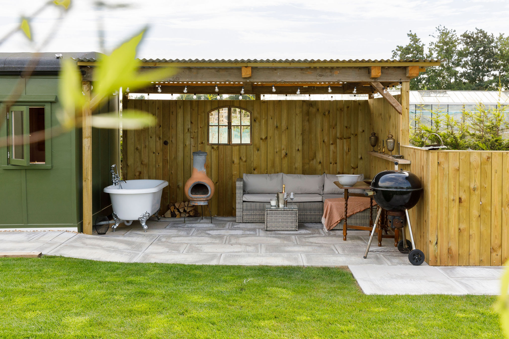 Outdoor relaxation at its best. Our WW2 train carriage comes with a private patio and a charming outdoor bathtub for a refreshing soak.