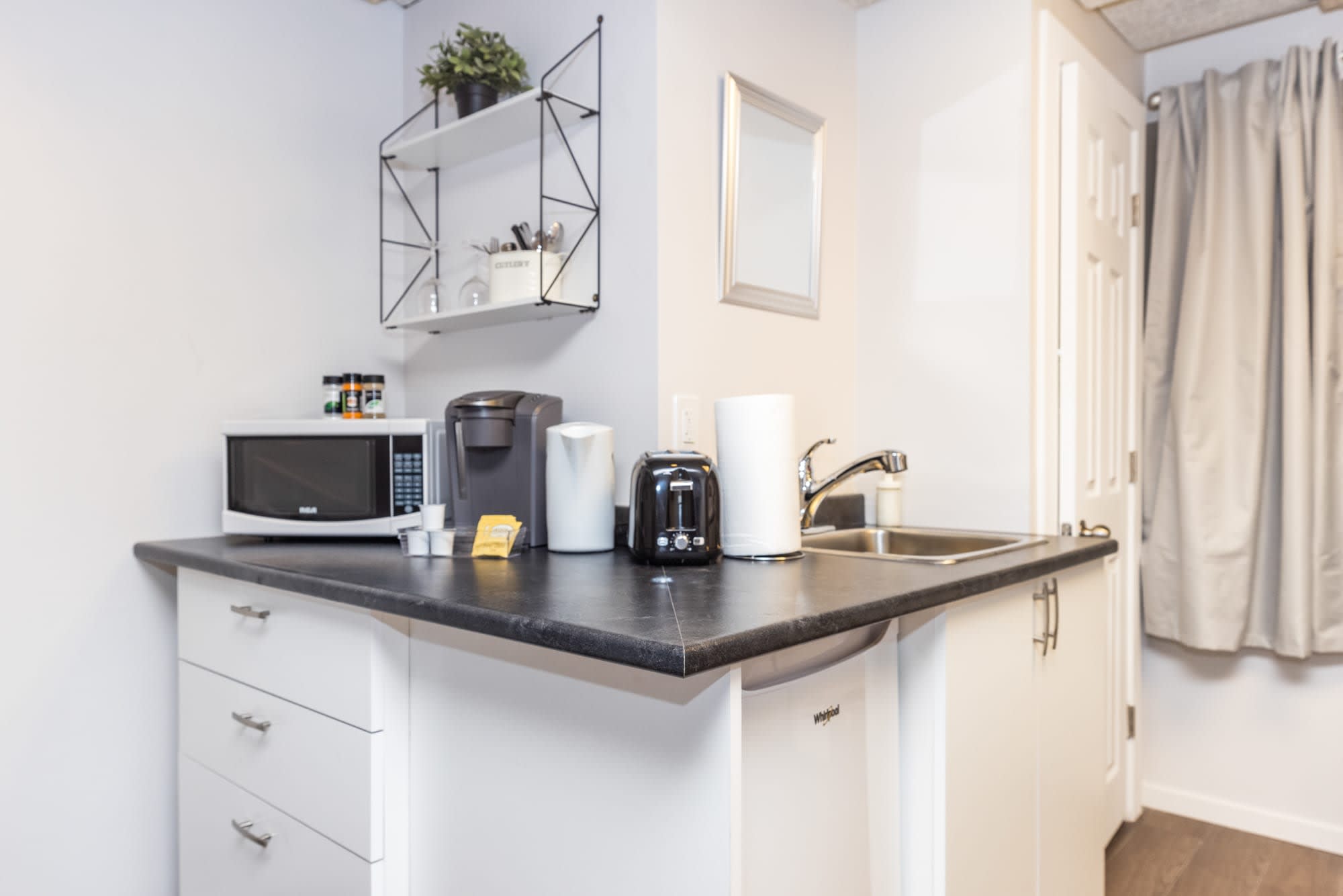 Chic Kitchenette with Appliances