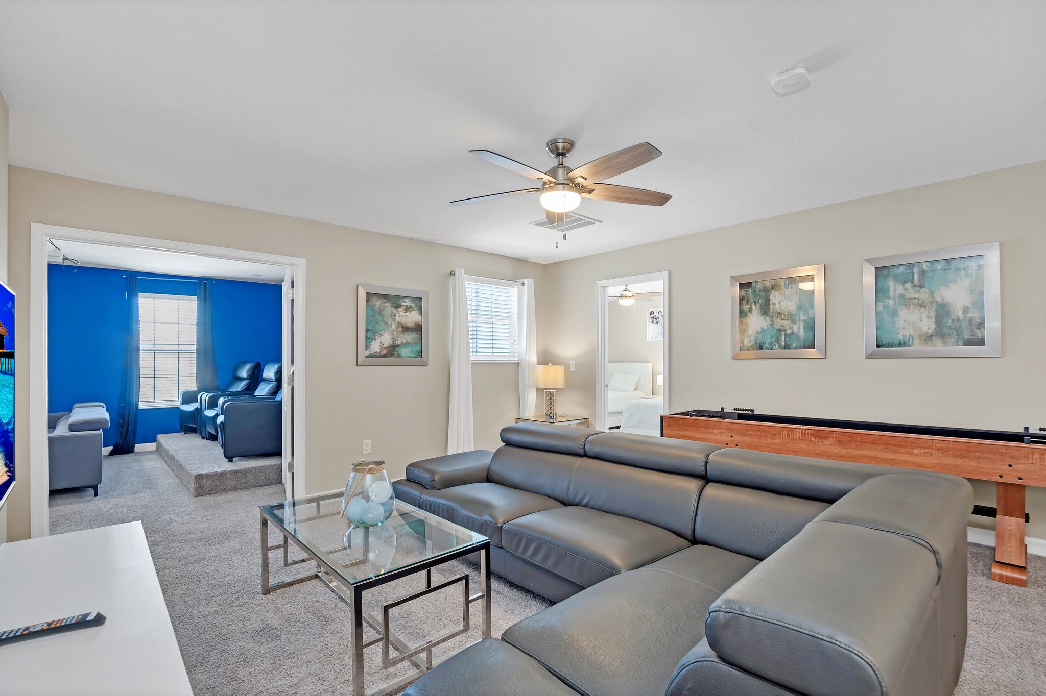 Upstairs Lounge with Shuffleboard and Movie Room