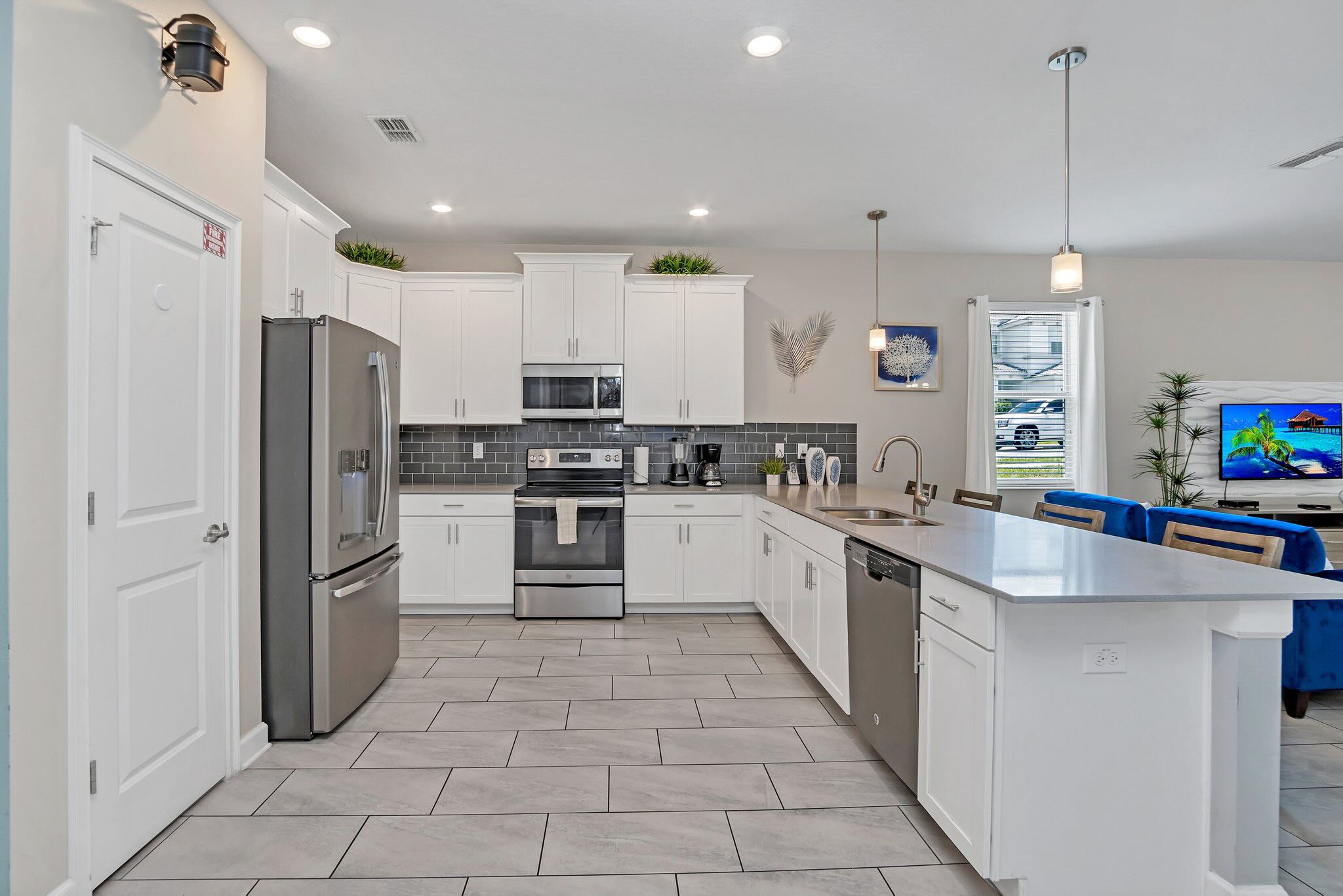 Fully Equipped Chef's Kitchen with Stainless Steel Appliances