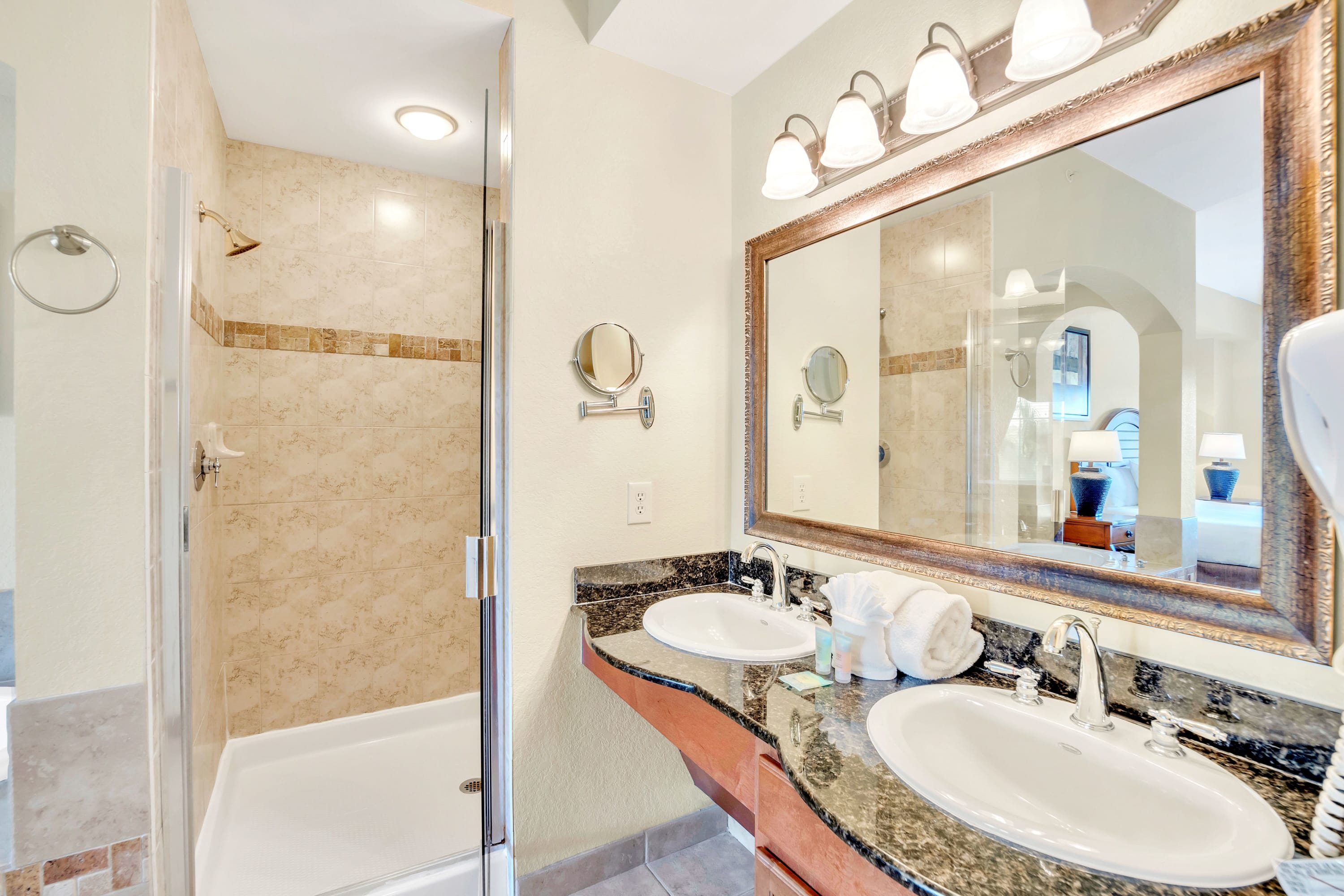 Bathroom With Granite Countertops, Double Vanity, And Beautiful Details