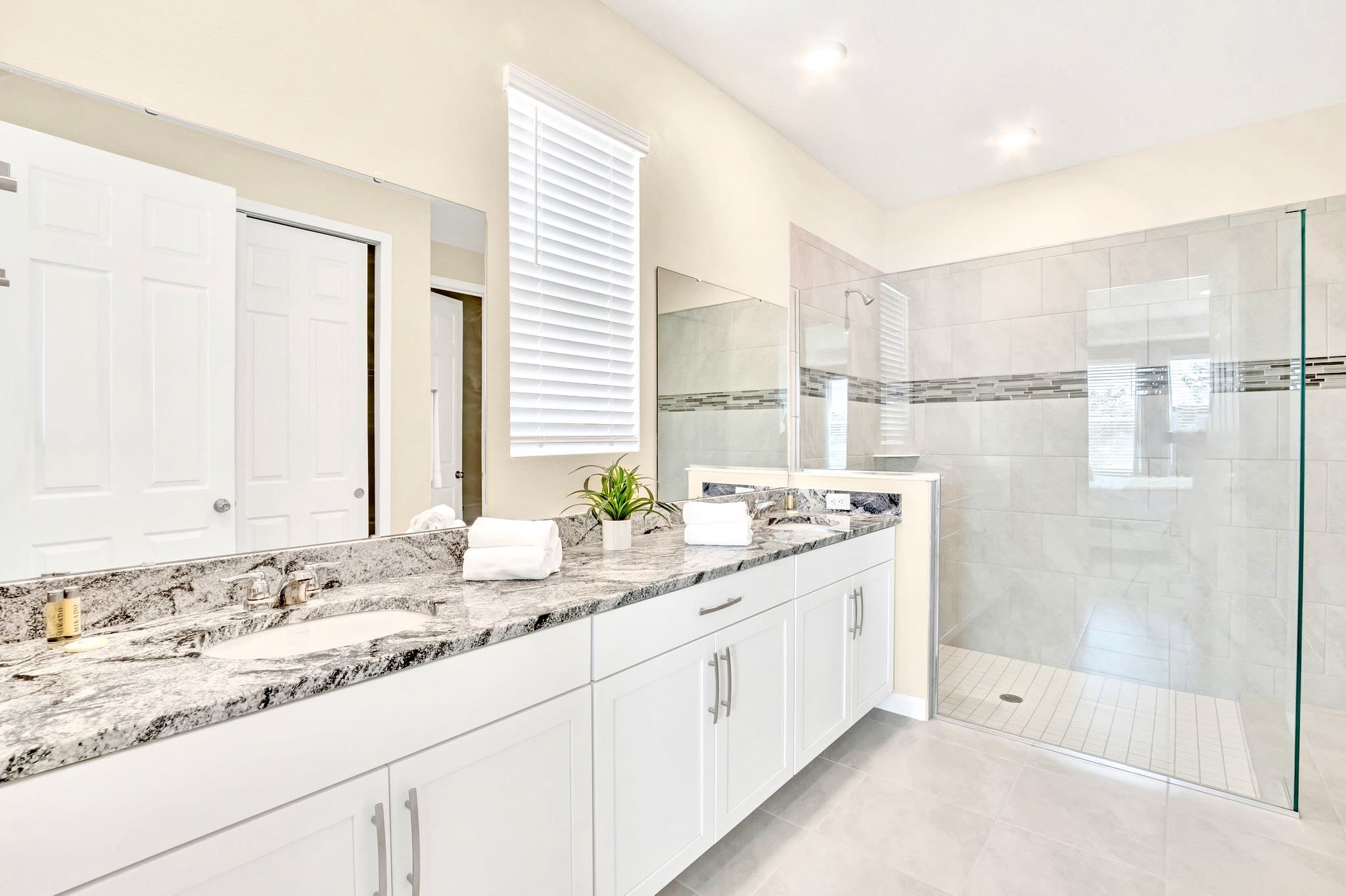 Luxurious Bathroom With Double Vanity And Walk-In Shower