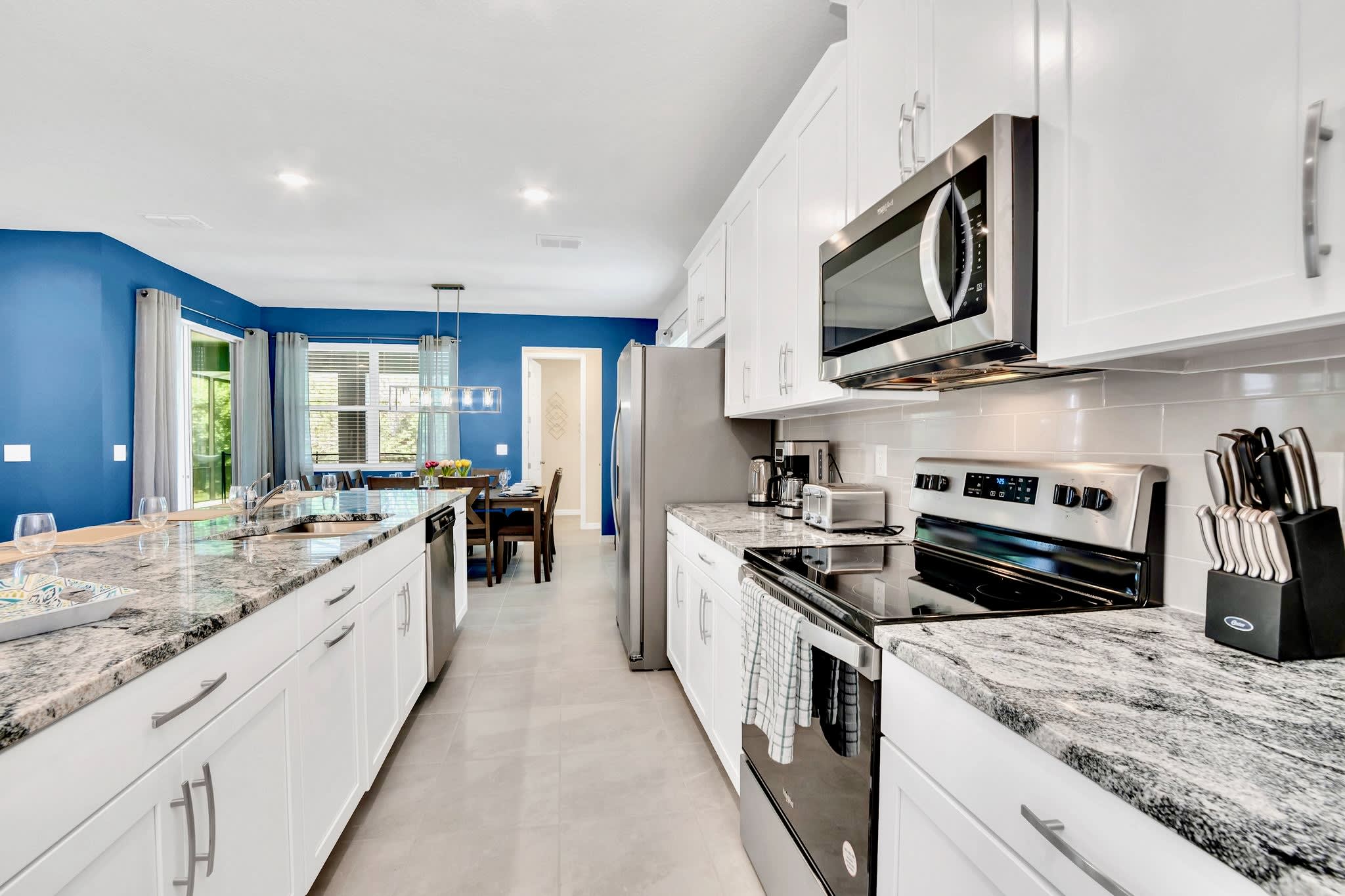 Bright And Open Kitchen Overlooking The Living And Dining Areas