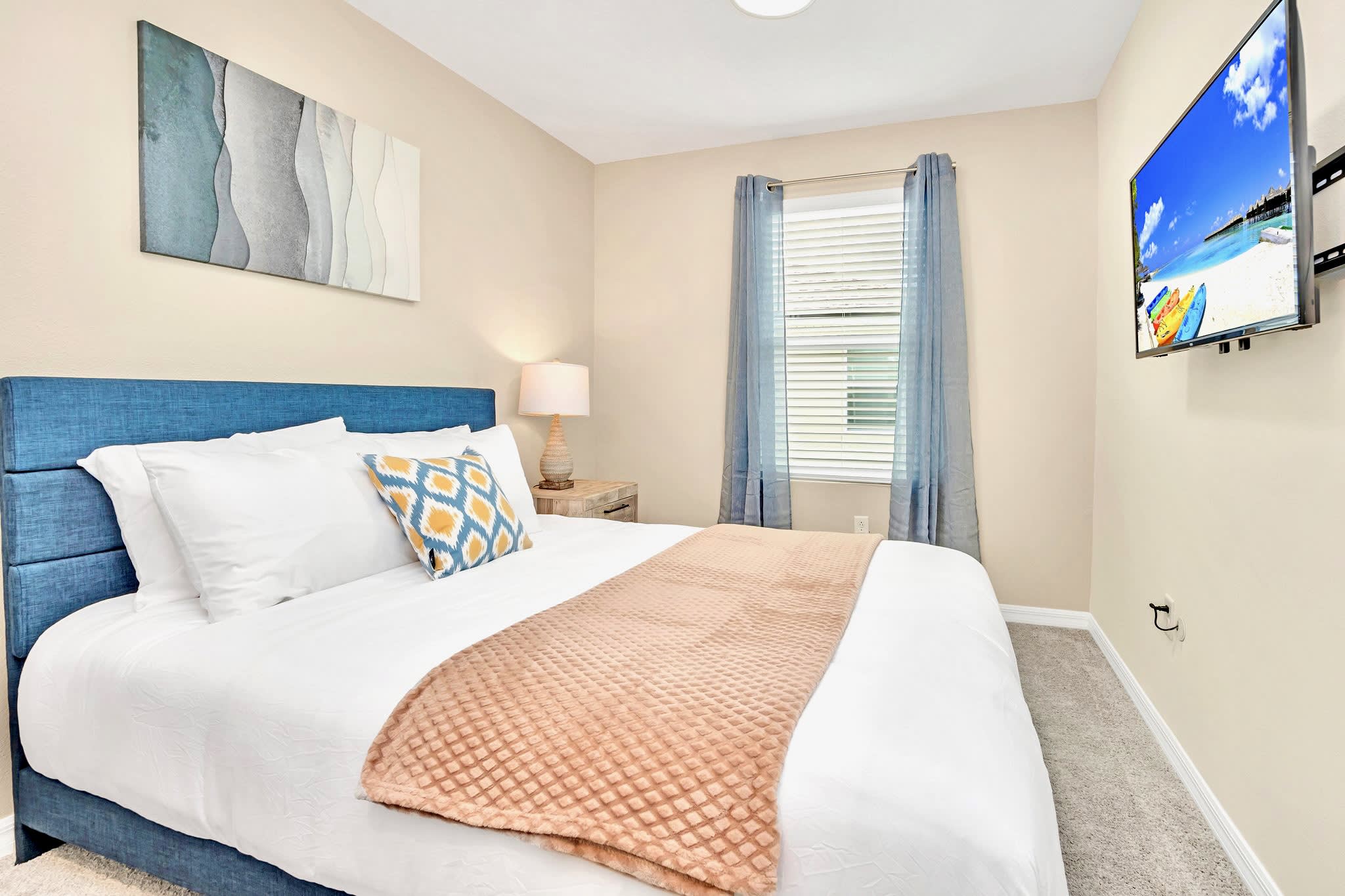 Spacious King Bedroom With Elegant Blue And Beige Accents