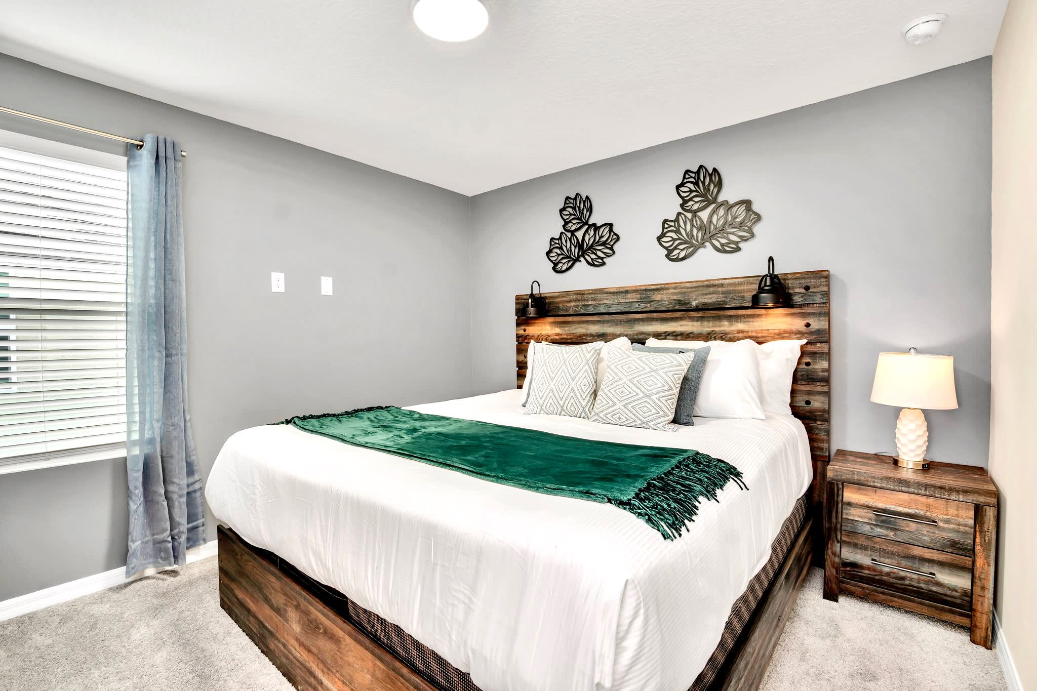 Queen Bedroom With Beautiful Wooden Details And Neutral Tones