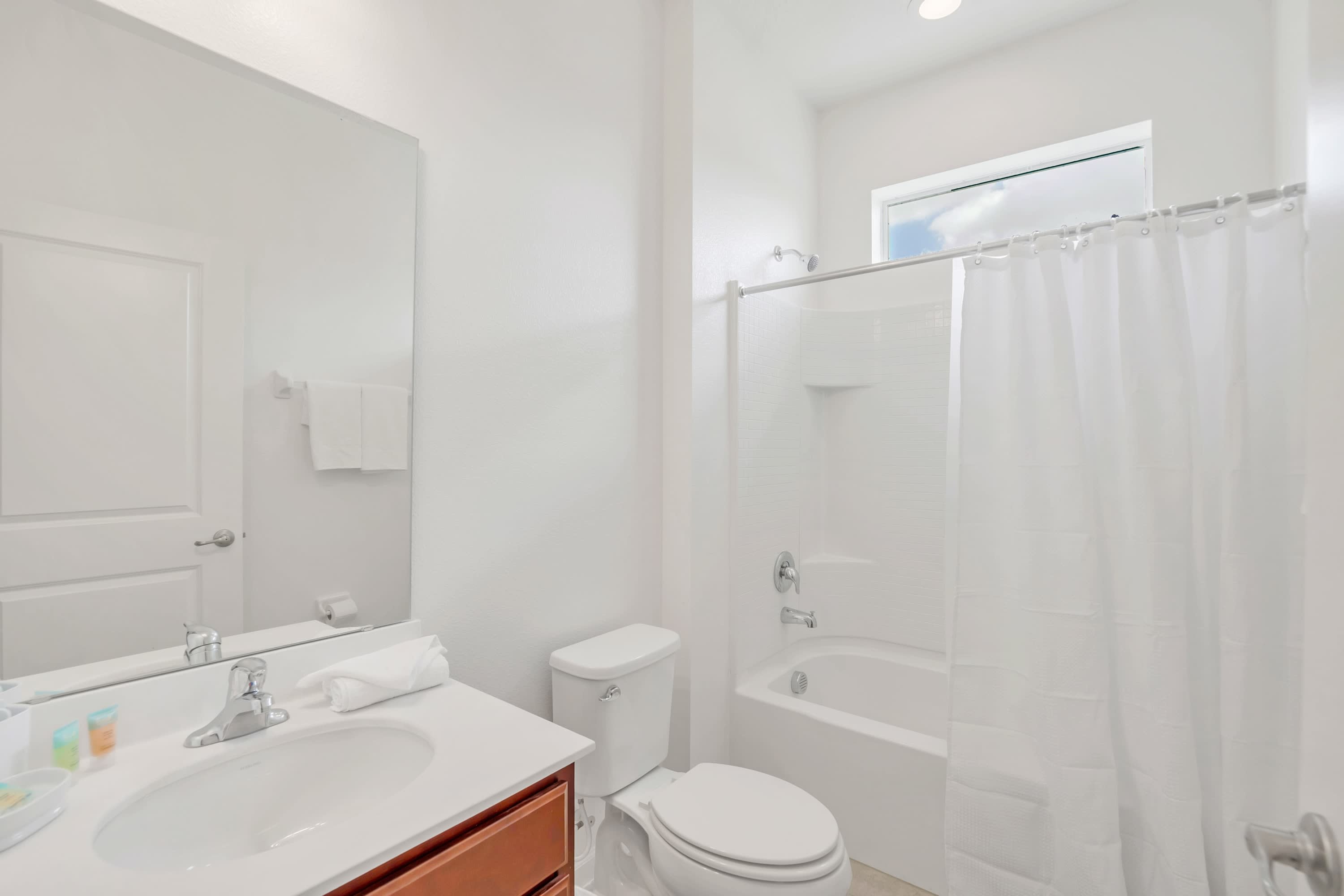 Sparkling Clean Bathroom With Shower And Bathtub Combination